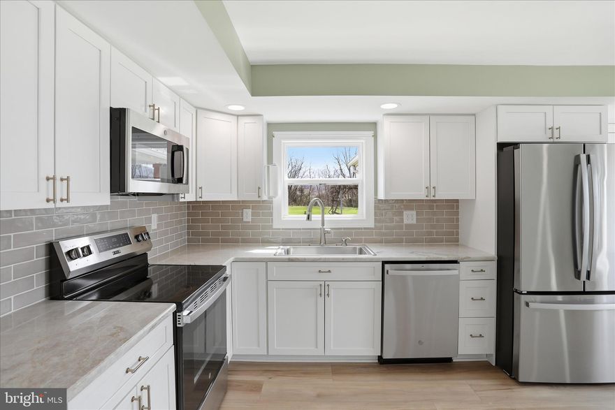 Countryside Comfort-Farmhouse 
Welcome to this beautifully renovated 3-bedroom, 2-bathroom farmhouse, which offers the perfect blend of rustic charm and modern updates 🏡🌿
Downstairs you will be greeted with warm luxury vinyl plank flooring, that flows throughout the home, creating a warm and inviting atmosphere. The spacious kitchen is a chef’s delight, showcasing sleek quartz countertops, stylish subway tile accents, and shaker-style cabinets—ideal for both everyday meals and entertaining guests. 🍽️ The downstairs area also includes a cozy family room and a dining space that seamlessly connect, perfect for making lasting memories with loved ones.
The hallway boasts an accented wall with hooks, offering a convenient spot for jackets and accessories. The bathrooms are thoughtfully updated for comfort and style, making daily routines effortless. Relax and unwind while enjoying the gorgeous mountain views from your new home—whether from the living room or the outdoor porch. 🌄☕
Upstairs, you'll discover three generous bedrooms, including a luxurious primary suite that provides plenty of space to relax and unwind. The primary suite features a large walk-in closet and an en-suite bathroom with a spacious walk-in shower—your private retreat after a long day. The other two bedrooms are equally spacious, perfect for family, guests, or a home office.
The lovely front porch, adorned with flagstone and charming cedar posts, adds undeniable curb appeal and creates a cozy spot to enjoy morning coffee or evening sunsets. Imagine sitting here, soaking in the peaceful countryside vibe. The warm, welcoming atmosphere of this sweet farmhouse invites you to make it your forever home.
Upstairs Primary Suite: Spacious with large walk-in closet & luxurious en-suite bath
Two Additional Bedrooms: Generous and versatile for family or guests
Charming Front Porch: Flagstone and cedar posts add rustic charm
Classic Farmhouse Feel: Perfect blend of cozy and elegant
Don't miss out on this incredible opportunity to own a piece of countryside comfort! Schedule your visit today and experience all the warmth and charm this lovely farmhouse has to offer.
Schedule a viewing today, don't wait, give me a call today 📞