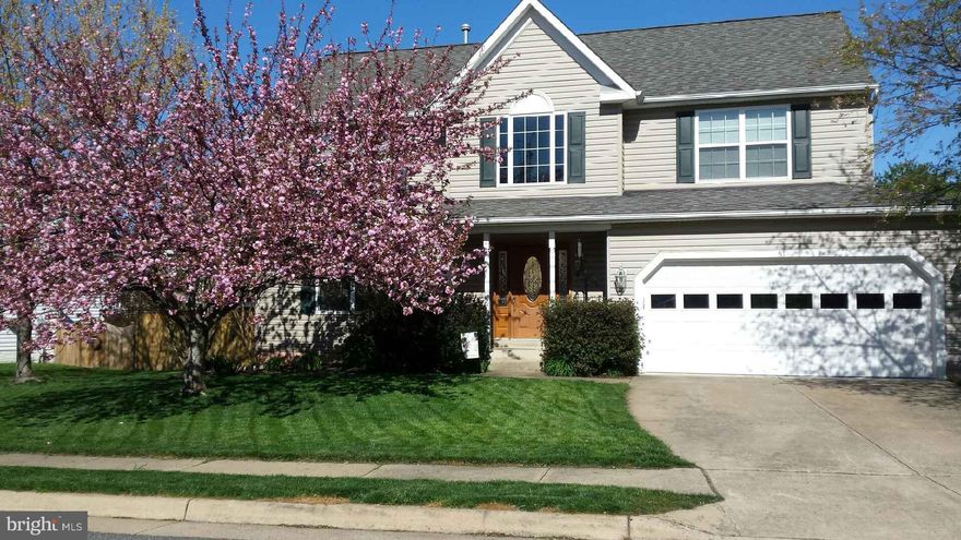 Completely upgraded home. Great floor plan.  Lots of hardwood on main level.  Completely upgraded kitchen.  3 finished levels.  Deck overlooks large, fenced, level yard backing to common grounds. Finished basement has large rec room, full bath and NTC bedroom.  Community pool, tennis, tot lot and walking trail.  Colonial Forge high school.