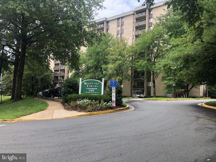 New price.  Owner says "Sell"  Reduced to sell  !  Beautifully renovated condo with one bedroom, one bath and den with closet and window.  Door could be added to use as bedroom or keep as is for use as an office or den .  COME HOME TO BRIGHT, LIGHT and SPACIOUS with that sparkling new feel   CORNER unit with extra window in dining room.   Extra window in den/bedroom for a very light-filled home.   Owner is offering  a HOME WARRANTY..  Gorgeous kitchen with all new appliances, refrigerator stainless steel. gas cooking.  Doors to close off kitchen from dining room.  Beautifully updated bathroom - all sparkling clean.   Large master bedroom with lots of closet space.  Closets in hallway, dining room and the  den/bedroom = STORAGE ! .Sliding glass doors open to balcony to top-of-the-trees view .  Well done new  flooring  throughout, including new carpet in bedroom.   Updated lighting - it's all there. Many community amenities inside and out.  Close to public transportation or quick drive to WDC.   Restaurants and shopping nearby.