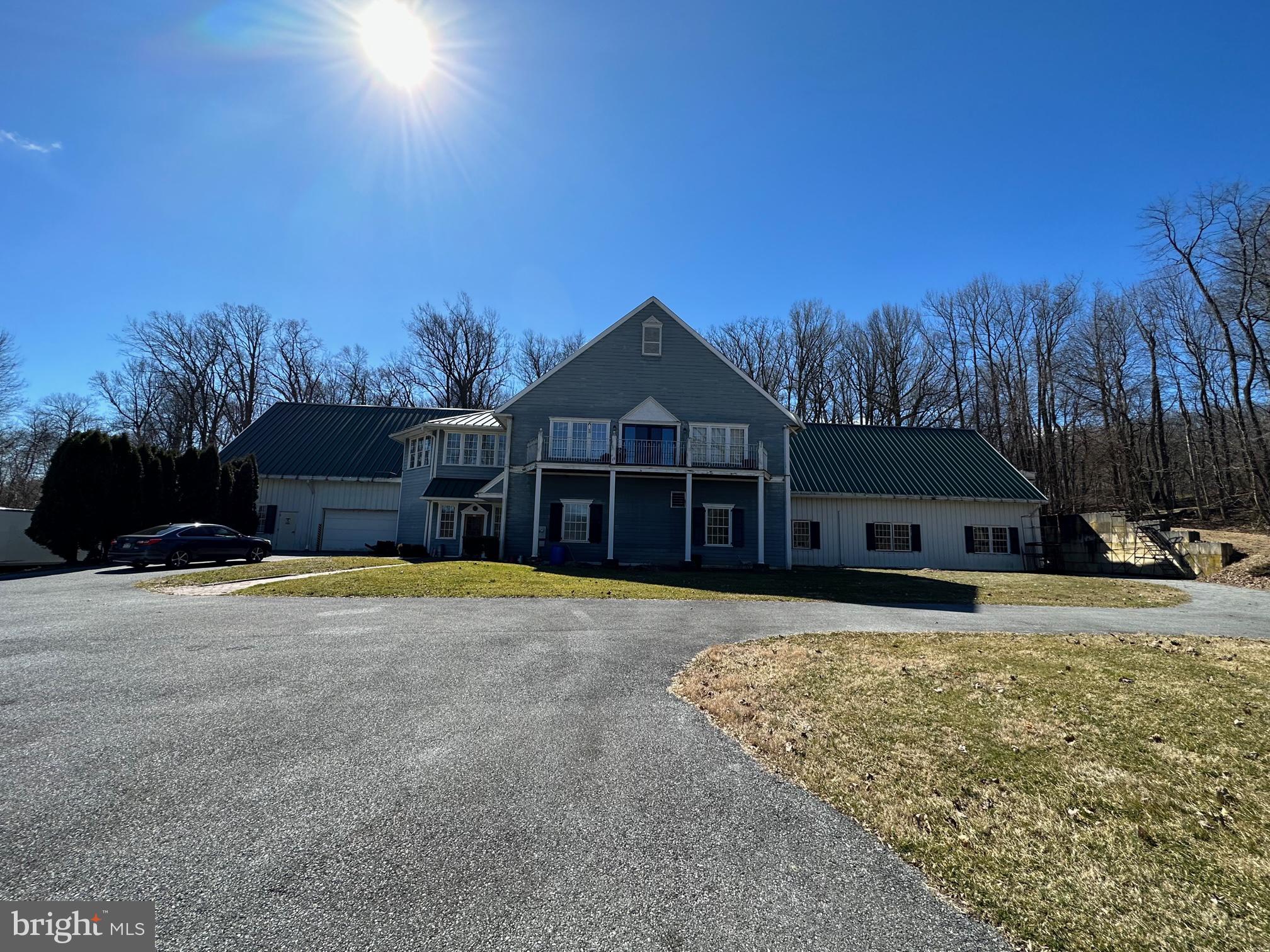 For more than 40 years, this 13 acre industrial park has been home to Vixen Hill Manufacturing. The property consists of 5 buildings totaling +/- 61,000 SF and a 33k SF development site. Great opportunity for a user, investor or developer. Flexible zoning allows for industrial, self-storage, multi-family and residential.
Great location in the center of Elverson Borough, Chester County. Approx. 3 miles to the PA Turnpike interchange and quick access to Routes 10, 176, 23, 322 and 100. Well & Septic are currently being used, but public utilities are available. Call for a survey and concept plan.
Building Details
Building 1 - 13,000 SF stone & block building with office, showroom and shop space. Dust collection system, 3 drive-in doors and 1 dock
Building 2 - 2,000 SF stucco pole barn with paint booth and 2 drive-in doors
Building 3 - 12,250 SF clear span steel butler building currently being used as a mill with dust collection system, 2 drive-in doors and 2 docks
Building 4 - 7,050 SF wood frame building on slab with 2 large drive-in doors, electric only
Building 5 - 26,600 modern steel and concrete two story building used for assembly and distribution. Small office area, dust collection system, 2 drive-in doors and 3 docks