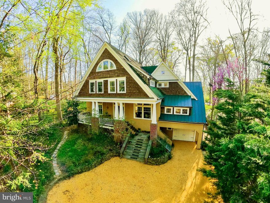 Spectacular Arts and Crafts custom-built home is situated on one of the more beautiful and quieter tree-lined lots located in Bethesda’s Walt Whitman HS district and features 5 bedrooms and nearly 5,000 sq. ft. of interior living space. Nestled back from the street on a sizeable .6 acre lot, you are greeted with a meandering tree-lined driveway leading you into your oasis set back far enough from the street to provide privacy from the street and neighbors. 

As you enter the home, the large windows in each direction provide views of the picturesque landscaping and maximize sunlight year round.  The main floor is a beautiful combination of formal rooms and open concept living. The spacious living room with vaulted ceilings, skylights, Juliette balcony, and wood burning fireplace makes it ideal for large gatherings and entertaining. Off the living room you enter a southern facing sunroom, perfect for your morning coffee and enjoying nature through the seasons. The spacious kitchen offers large bay windows that fill it with natural light, making it a delight to cook and entertain. The center island, multiple storage cabinets, granite counter surfaces with gas stove make the kitchen a chefs’ delight. The den in the west wing offers a built-in wall of cabinets, storage closets, children’s playroom, powder room, and French doors connecting it to the elegant dining room. The large, tree-lined backyard is landscaped with a flagstone patio, wood deck, and plenty of foliage making it a gardener’s delight in a rural like setting.

On the 2nd floor, the grand primary suite offers privacy and elegance with multiple closets, en-suite vaulted bathroom and large walk in closet that provides all the space you need to relax. There are two additional bedrooms and one large bathroom on the floor. On the 3rd floor, there is a large private office with custom built file cabinets and skylight which gives you a tree top view. With an adjacent flex room with bed and full bath, this floor can be its own suite. 

The lower terrace level is an ideal in-law suite with three rooms and a full kitchen with washer dryer or could be rented out as a separate apartment which is licensed with Montgomery County (it is connected via the main staircase and can be closed off if desired) .  This suite has tall ceilings, large bedroom, storage room, great living/game/tv room with its own private entrance. The attached 1.5 car garage has ample storage for all your needs.  Only a 7 minute drive to downtown Bethesda & Metro - and an easy commute into DC! 

This rare home is the quintessential blend of city life and private country living! Open Saturday 1-3pm.
