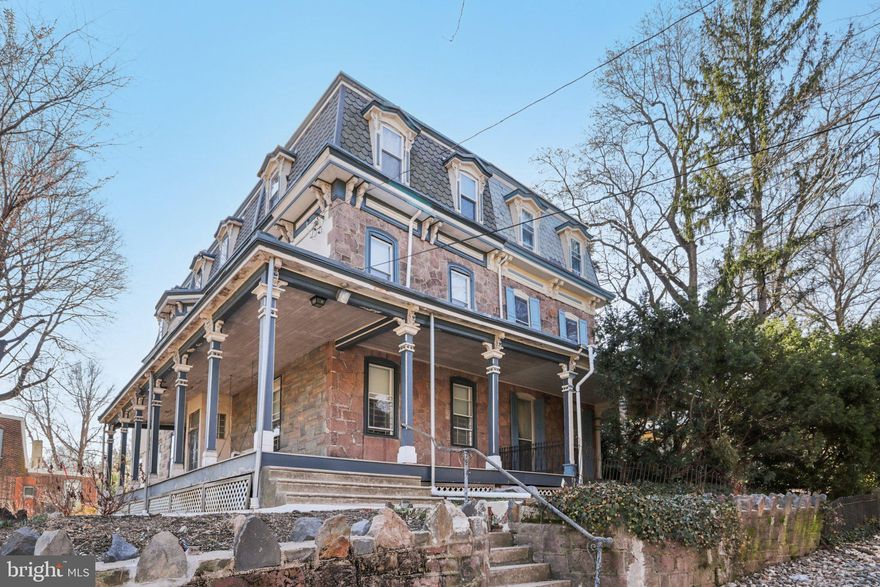 Beautiful historic twin on a double lot with PARKING on one of the Penn Alexander Catchment’s most desirable tree-lined blocks. c.1870. 5 bedrooms plus a family room, 2.5 baths. Incredible outdoor space that includes a wraparound porch, front garden, large rear patio/garden, and a huge side garden/patio/wooded area that sits on the double lot. This home offers stunning character such as towering ceilings; capacious spaces; oversized windows; original hardwood floors; moldings and wainscoting; and a charming, eclectic (yet practical) layout. Ample light from three exposures including the open southern views from the rear and the west along the spacious side-yard.

The 1st floor offers a private entry vestibule that opens into a center hall. A large living room, separate dining room, and spacious south-facing eat-in-kitchen. The 2nd floor with two very large bedrooms, a family room and full bath (or primary suite, family room , and den/office). The 3rd floor offers three more bright bedrooms and a full bath. Very spacious dry basement for significant storage. Excellent storage throughout as well. Newly rewired to replace all knob & tube, as well as new electrical box. Main floor laundry.

This warm and wonderful home with incredible light and character (and driveway parking) is located on a historic Spruce Hill block in the PENN ALEXANDER CATCHMENT. An ideal location—Easy walk to the school, Clark Park and its fabulous Farmers' Market, Knockbox Cafe, Green Line Cafes, ReAnimator Coffee, Baltimore Avenue's Restaurant Row (so many places to eat), Don Barriga Mexican Grill, Doro Bet, Clarkville, Gojjo, TacoTaco Mexican, Local 44 and the Bottle Shop, CVS, and so many coffee shops, restaurants, and shopping. Close to HUP, CHOP, Penn, Drexel, UCity Tech/Science Corridor. 94 WalkScore!! 12 minutes to Center City by car or bike and plenty of convenient SEPTA options.

NOTE—This stunning home is both individually designated on the Philadelphia Register of Historic Places and situated in the Satterlee Heights Historic District.