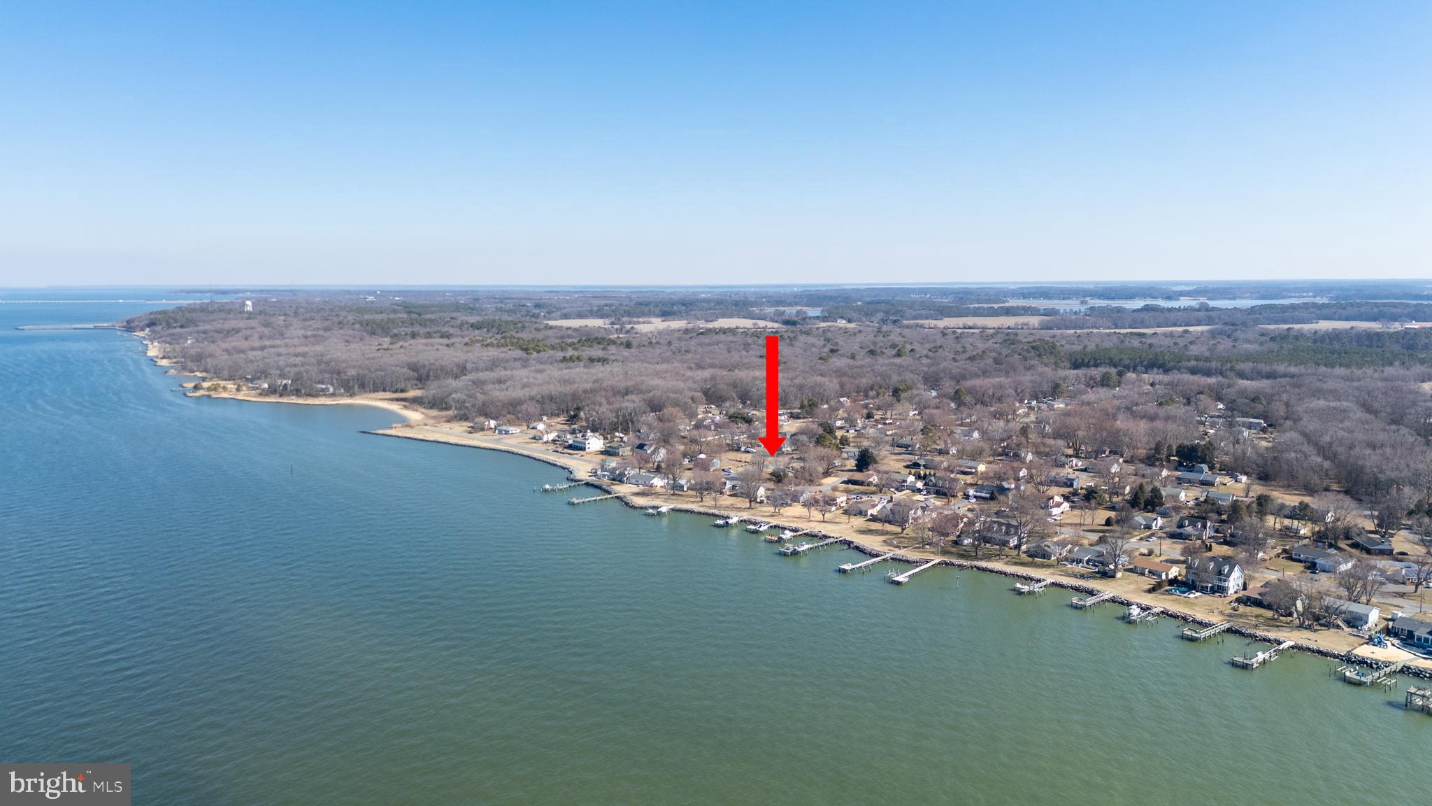 Great water view lot in sought after Chesapeake Estates. Come enjoy "Island Life" at its best as this building lot has public sewer being installed this spring so apply for a building permit or invest for later. Check out the amazing cross island trails (bike or walking/jogging), public piers, marinas, boat ramps, parks, doctors offices, restaurants, shopping & so much more nearby. Beautiful community waterfront park just down the street. Hurry this won't last long as owner will consider all offers.