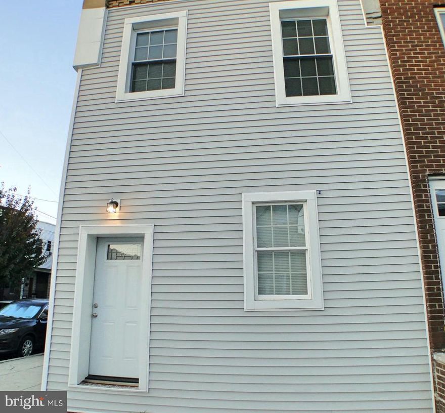 This immaculately renovated home in Point Breeze is what you have been waiting for. With 3 bedrooms, 2.5 bathrooms, a finished basement and a private yard, this home has it all. The corner home offers additional windows on the side bringing in an abundance of natural light.  The extensive renovation included replacing all the mechanicals, adding siding, new heating/air conditioning  as well as all new cosmetics, so this home is ready to unpack and move right in.
Enter from the side door into the foyer area with the double laundry closet next to the half bathroom. In the front of the home is the brand new kitchen complete with white shaker cabinets, stainless steel appliances and granite counters. This space offers multiple options including utilizing the extra space as an eat in kitchen.
Continue to the rear of the home which houses the spacious living room with sliding doors leading to the fenced in the backyard.  The large space and natural light from the side and rear will make this living and dining area combination space even more enjoyable.  The rear yard has great space for gardening, grilling, entertaining, pets and children.
The finished basement offers an expansive amount of additional living space to suit any needs. This would make a great family room with space still for an offer and/or playroom.  The mechanicals of the home are neatly tucked away in the front closet and this area also provides added storage space.

On the second floor, you will find three bedrooms and two full bathrooms. All bedrooms are abundant with natural light from the new windows and have thoughtfully placed closets for great storage space. The main bedroom suite offers a spacious room with double closets and a private bathroom. The bathroom features a modern vanity and stand up shower with tile surround.  The hall bathroom has a tub with tile surround.

The home has a high efficiency heating and air conditioning system that includes a split system heat pump with two air handlers that will ensure the perfect temperature year round. The first floor has wall mounted units and the second floor has a blower unit with central ducts.

Located in a prime location with lots of development still continuing in the neighborhood, this is the home you have been seeking.  Just minutes to shopping, restaurants and parks, as well as close to public transportation, this home offers all the elements for a perfect carefree city home.