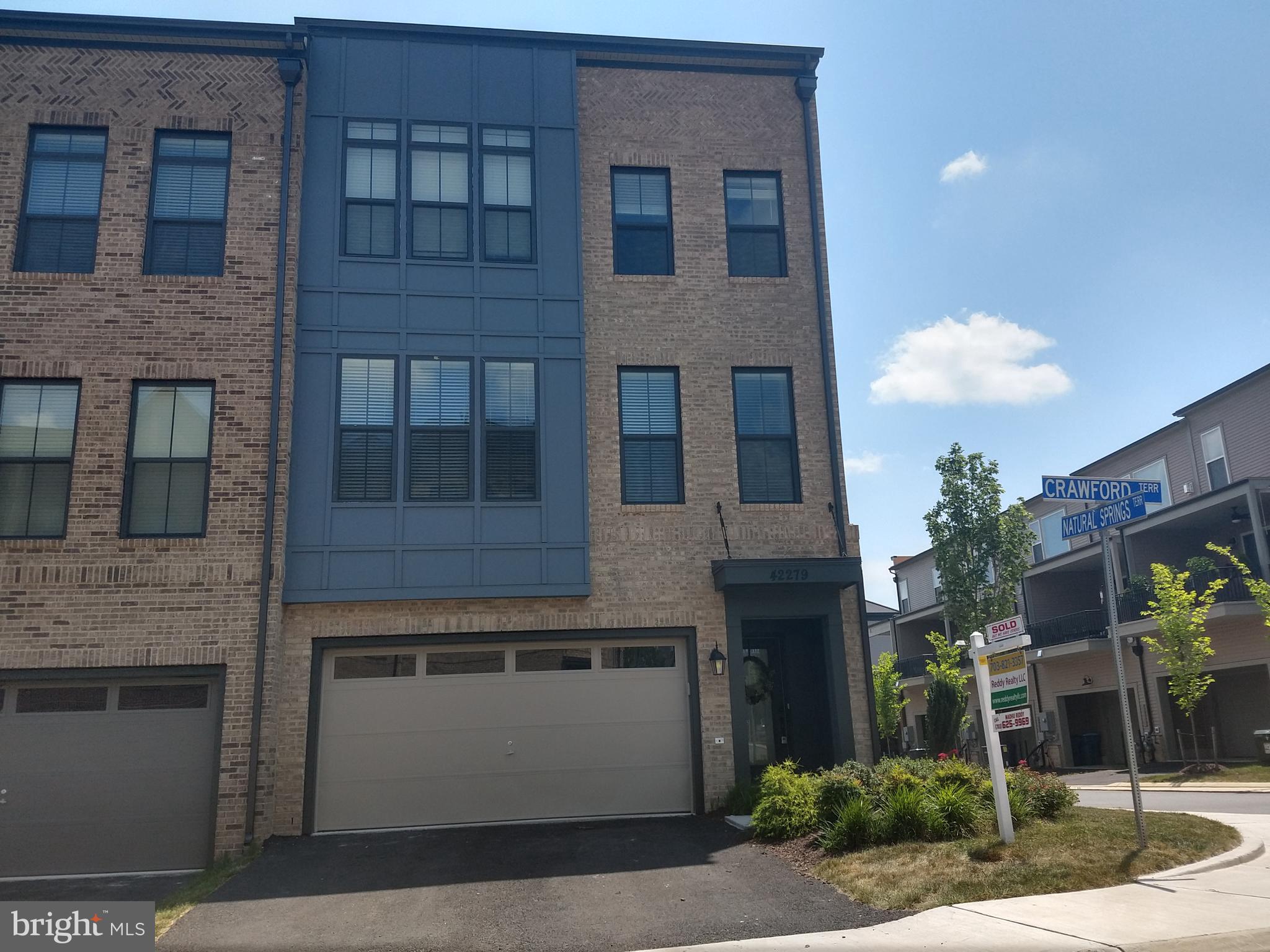 Location! Beautiful Van Metre Parker End Unit with 3200 sft on 3 Levels Featuring 4 Bedroom, 3.5 Bath, 2-Car Garage , Light-filled, Open spaces and Upscale finishes, High quality Upgrades, Having a Gourmet Kitchen on the Main Level with a Large Island including Stainless Steel Appliances. Experience one of the country's best planned communities Brambleton! . Nice Deck. Walking distance to the Brambleton Town Center with Movie Theaters, A Huge Library, HarrisTeeter & Many Restaurants. . . Internet and Cable TeleVision Included in Rent.