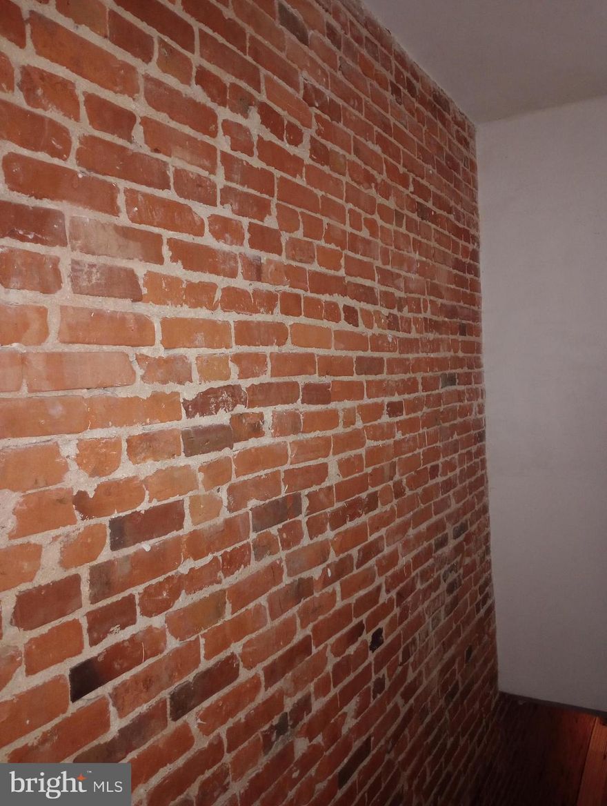 INVESTORS ALERT!!   ABOUT 75% FINISHED, NEW ROOF, NEW WINDOWS, NEW HVAC, NEW ELECTRIC & PLUMBING!!  NEWLY SHEETROCKED THROUGH HOUSE, JUST NEEDS YOUR FINISHING TOUCHES!! CLOSE TO JOHNS HOPKINS, SHOPPING, PARKS, MARKETS, BELTWAYS, DOWNTOWN AND MORE!! SOLD AS-IS!!