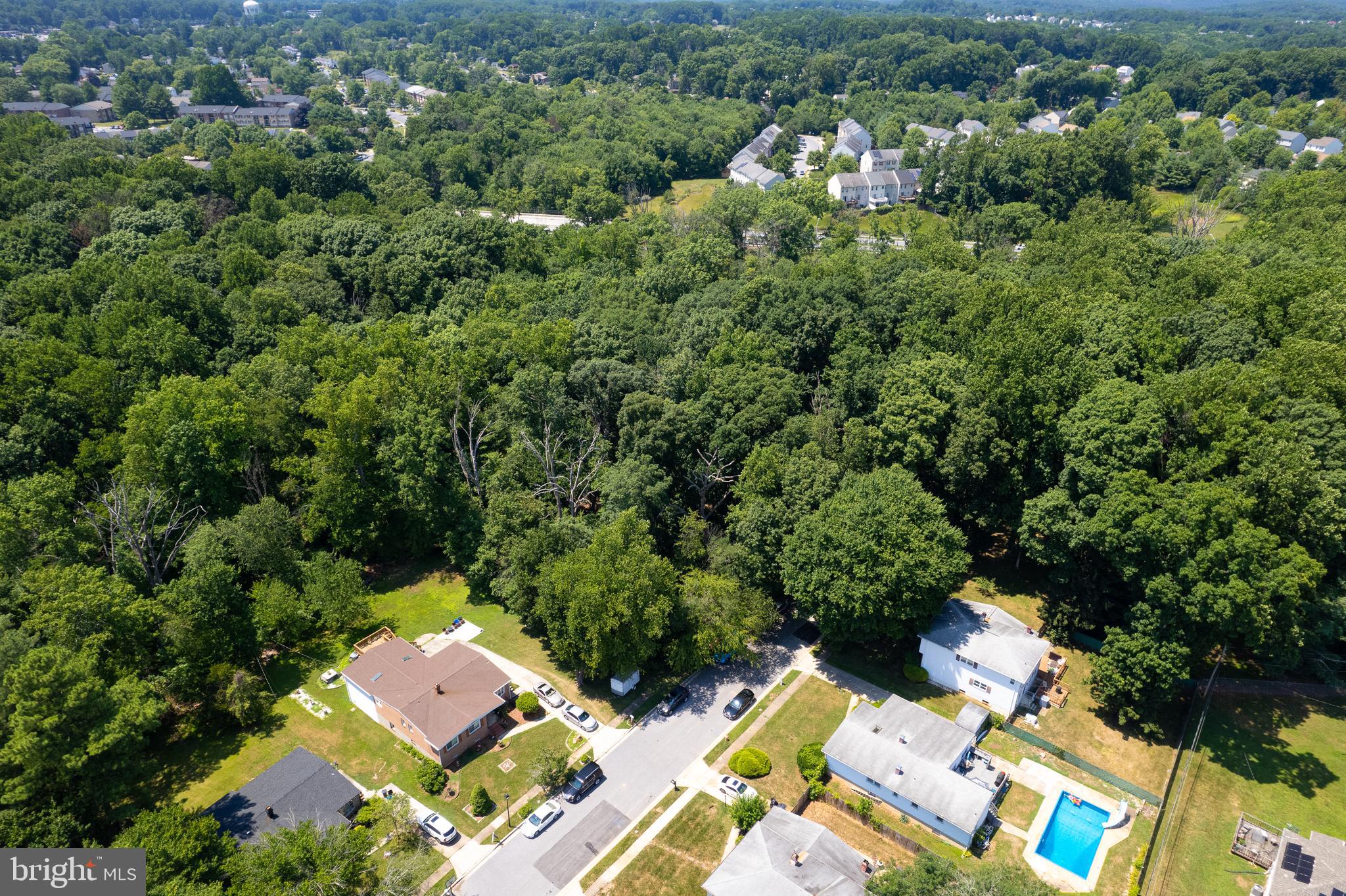 Discover the perfect canvas for your dream home with this charming corner lot at the end of Jodale Road, located in the Pikeswood community of Randallstown. Nestled in an established and serene neighborhood, this private lot is surrounded by mature trees, offering a tranquil and picturesque setting. Enjoy the charm and community feel of an established neighborhood. The property has been professionally surveyed, ensuring clear boundaries and a hassle-free building process. There are no builder tie-ins, allowing you the freedom to choose your own builder and design your custom home exactly as you envision. Whether you're looking to build your forever home or a peaceful weekend getaway, this lot provides the perfect setting for your new beginning. Embrace the beauty of nature and the convenience of an established community with this exceptional corner lot on Jodale Road. Start planning your dream home today!