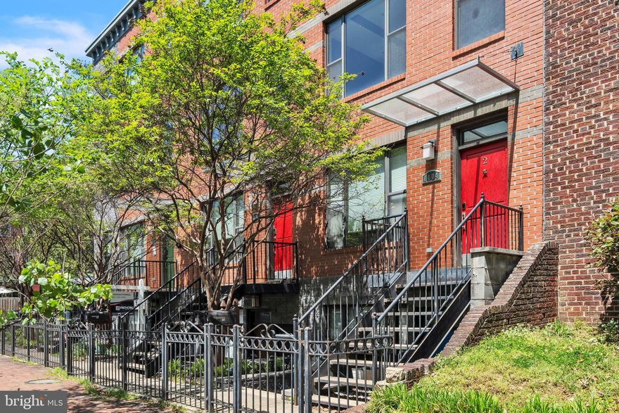 This bright and open 2-level loft-style condo in Capitol Hill offers over 1,500 sq. ft. of modern living space. Features include soaring ceilings, massive windows, and warm hardwood floors throughout. The gourmet kitchen boasts granite countertops, wood cabinets, stainless steel appliances, and a pantry. The second-story loft overlooks the first floor and is ideal for a media room, office, or exercise space.  The master suite on the upper level includes a luxurious bath with a spa-like multi-function shower and double vanity. Both spacious bedrooms have private balconies and walk-in closets. Additional amenities include a massive common roof deck with sweeping views, a tankless hot water heater, and assigned parking. The condo is pet-friendly and has a very low HOA fee. Located close to Metro, Harris Teeter, dining, nightlife, shopping, gyms, parks, and more.