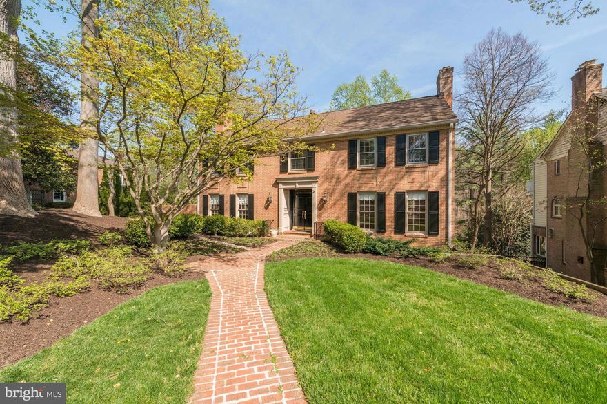 Wonderful, sunny  home that has been lovingly tended & updated thruout.  4 Beds/4.5 Baths.  Renovated kitchen opens to Great Room and Breakfast room, which each lead to an inviting screened-in porch overlooking the pool and parkland. Huge Living Room & Master Bedroom, each with gas fireplace &  windows on three sides. Lower Level Family Room & 4th Bedroom. Charming patio off kitchen. 2 car garage.