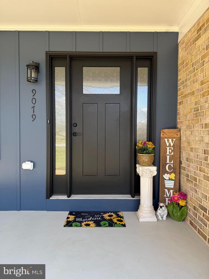 Welcome home to this gorgeous updated gem in Myersville with 1.57 acres where every detail has been thoughtully designed to make everyday living comfortable, stylish and easy! From the moment you arrive, you'll notice the incredible curb appeal with all NEW siding, windows, doors and a brand-new architectural roof.   Enjoy your morning coffee or unwind in the evening on the brand NEW covered back porch with panoramic beautiful mountain views and amazing sunsets , complete with a ceiling fan and recessed lighting.  You will LOVE the gigantic family room with lots of natural sun light all around to entertain family and friends. The NEW driveway, walkways, patio, and outdoor lighting make the entire exterior feel fresh, welcoming and ready to enjoy!  Step inside and you're greeted by a bright, modern interior filled with upgrades  at every turn.  The heart of the home is stunning kitchen, featuring sleek quartz countertops, a spacious 10-foot island, stainless steel appliances and beautiful cabinetry with thoughtful touches like pop-up electric outlets  and soft-close doors.  It's the perfect space for cooking, gathering and making memories.  The main level is enchanced with rich Brizilian cherry hardwood floors and elegant crown molding creating a warm and inviting atmorsphere throughout.  Downstairs the fully finsihed basement with complete ceramic tile floors is ready for entertaining with a custom bar area and  quartz countertops, glass cabinets, a stainless steel sink and a beverage fridge - ideal for hosting friends or cozy nights in.  You'll  also love the spacious laundry room on the main floor designated with plenty of storage, new sink and vanity.   Fresh paint, NEW lighting and updated finishes throughout give the home a clean, move-in ready feel! Plus, major upgrades  like two zone NEW HVAC units one for each level, water treatment, well pump with battery backup offer peace of mind for years to come. This home truly has it all- modern updates, inviting spaces and thoughful details that make it easy to fall in  love the moment you walk in.  So don't wait ....this could be your NEW HOME!!