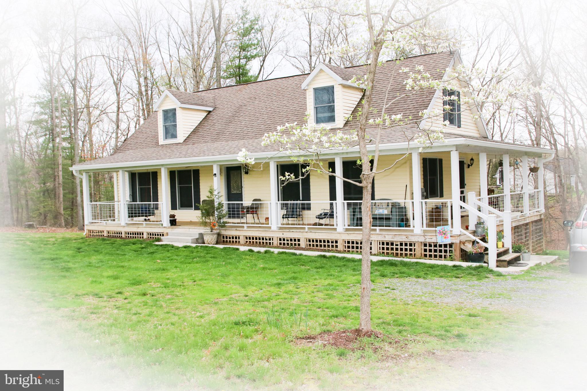 Lovely Cape Cod on Private, Wooded 5 acres. With 3 very spacious bedrooms and 2.5 baths, this home offers the quiet serenity in a rural setting. New flooring, new porch and more offer the perfect country setting. HVAC system system is contracted for and will be installed upon arrival of equipment, with original baseboard heat remaining in place to provide 2 sources of heat. The workshop/garage is almost like a second house, with the upper floor already containing insulation, electric and new windows. Water is run to the garage/workshop as well. This is the perfect place for a studio, workshop, cottage industry and more! While the home is on a crawl space, it is high enough to walk around and even keep your freezer, etc down there. Relax on the front porch or the rear deck, with plenty of acreage to move around and explore. Lots of wildlife will keep you looking out the windows. Additional 22 acre parcel available (Lot 6 Kesecker Farms). Can be purchased separate or together as a package deal. Don't miss this one!