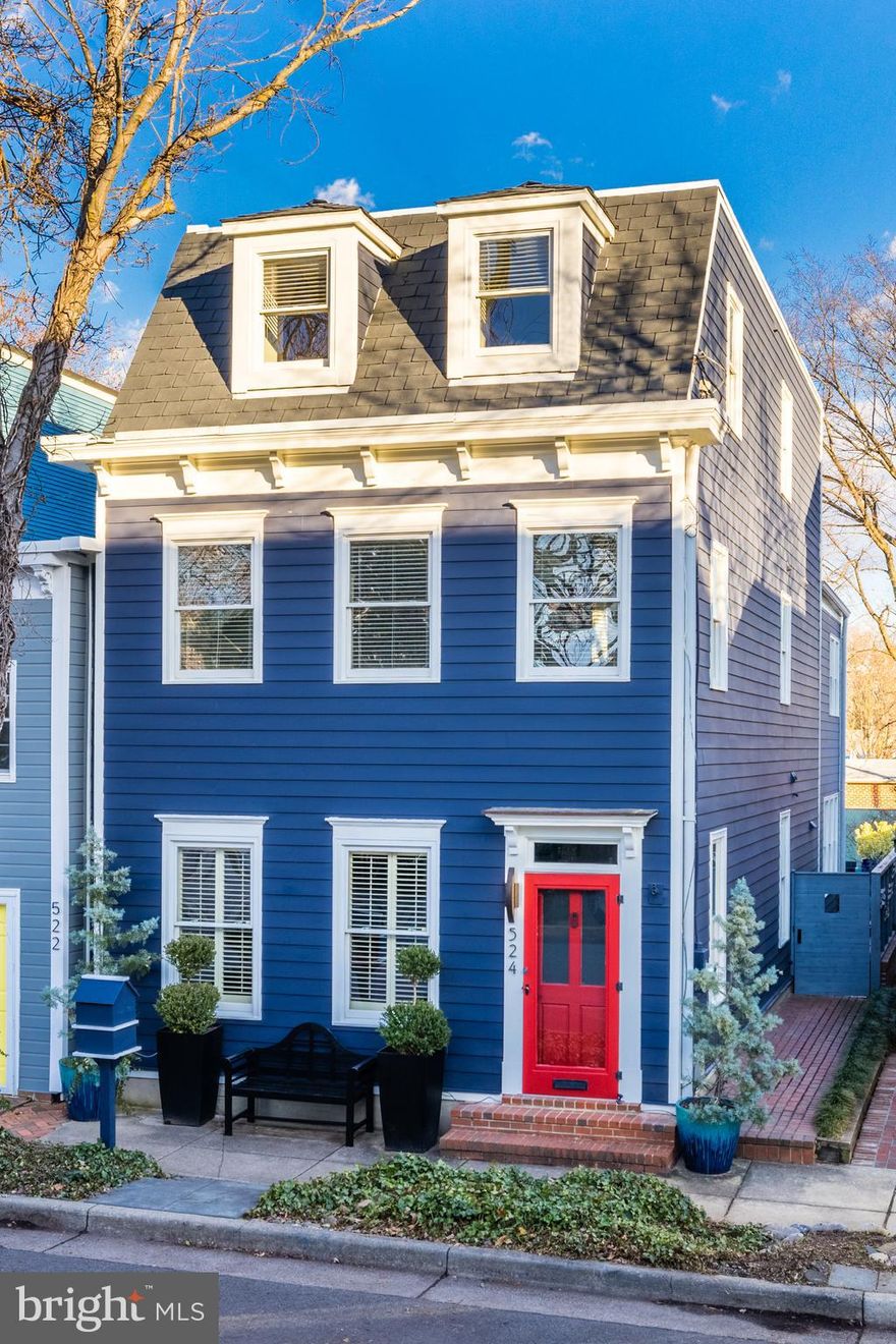 This  pristine deep blue townhouse in Old Town's southeast quadrant features 4 bedrooms, 3.5 baths, hardwood floors throughout and exceptional natural light pouring in from three sides.  Both contemporary and traditional elements  include high ceilings, columns defining living and dining areas, recessed lights, built-ins and an open floor plan with spacious kitchen/family room with a gas fireplace.   Custom plantation shutters shield the natural light when you wish and allow privacy in the evenings.  The stylish primary suite offers two walk-in closets, a gas fireplace and a spacious adjoining primary bath with dual vanities, soaking tub and separate shower.  The laundry is conveniently located a few steps away on the same floor.  The 3  guest rooms are all sizeable with large closets and fully updated baths.  You'll be swept away with the private patio/garden area.  Walk under the stone arch and make a wish.  The garden was professionally landscaped by McHale Landscaping with an elaborate irrigation system.   There is plenty of room for an outdoor dining table near the water source and pond.  Then take a few steps into the deeper slate patio and you can enjoy the fire pit.  Completing this remarkable property are two off street parking spaces and a storage shed behind the rear fence.