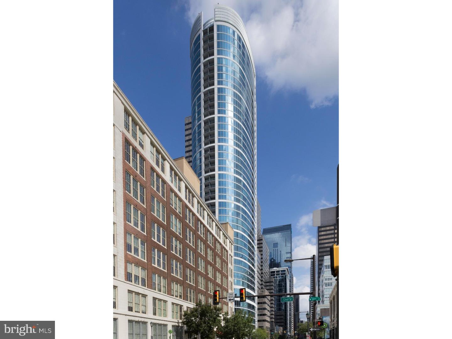 Enjoy expansive views and high-end design features in this award-winning home at the Murano Condominiums.The current homeowners, with the help of local architectural interior designer Carlo Fiammenghi, created a unique floor plan by combining 2 units on the 28th floor. The condo was designed with a contemporary European flair and won the Silver Dream Home Award 2011. It was also the subject of a feature article in Philadelphia Style magazine. The main floor open layout features more than 2,000 square feet of luxurious living space, many floor-to-ceiling windows, 2 master bedroom suites, 3 full bathrooms, living room, dining room (which could be converted back to a 3rd bedroom), 2 balconies, full-size main floor laundry, 9-foot ceilings, programmable custom lighting, and ceiling-mounted speakers throughout. Italian glass doors by Lualdi greet you at every doorway and bamboo floors cover the main living area. The recently remodeled kitchen features granite countertops, a matching granite backsplash and new Bosch stainless steel appliances. The primary master bedroom suite features endless views whether you're relaxing inside or enjoying the private balcony. Beautiful white tile floors adorn the master bedroom. The oversized master walk-in closet is outfitted by Poliform. A master lounge can also double as a home office. A stunning master bathroom with a soaking tub, oversized shower, custom-made vanity and tub surround and heated blue marble floors keep your feet comfortably warm. The 2nd master bedroom offers stunning city views, en suite bathroom and a full wall of custom closets shelves and draws, all tastefully hidden behind Lualdi sliding glass doors. 3 deeded parking spaces and 5 exclusively licensed storage lockers easily satisfy your parking and storage needs. The Murano is an amenity-rich building, which features 24/7-concierge service, an indoor heated lap pool, large sun deck, state-of-the-art fitness center and hospitality room. Do not miss this opportunity to own such a rare condo!