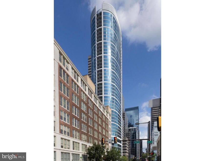 Enjoy expansive views and high-end design features in this award-winning home at the Murano Condominiums.The current homeowners, with the help of local architectural interior designer Carlo Fiammenghi, created a unique floor plan by combining 2 units on the 28th floor. The condo was designed with a contemporary European flair and won the Silver Dream Home Award 2011. It was also the subject of a feature article in Philadelphia Style magazine. The main floor open layout features more than 2,000 square feet of luxurious living space,  many floor-to-ceiling windows, 2 master bedroom suites, 3 full bathrooms, living room, dining room (which could be converted back to a 3rd bedroom), 2 balconies, full-size main floor laundry, 9-foot ceilings, programmable custom lighting, and ceiling-mounted speakers throughout. Italian glass doors by Lualdi greet you at every doorway and bamboo floors cover the main living area. The recently remodeled kitchen features granite countertops, a matching granite backsplash and new Bosch stainless steel appliances.  The primary master bedroom suite features endless views whether you're relaxing inside or enjoying the private balcony. Beautiful white tile floors adorn the master bedroom. The oversized master walk-in closet is outfitted by Poliform. A master lounge can also double as a home office. A stunning master bathroom with a soaking tub, oversized shower, custom-made vanity and tub surround and heated blue marble floors keep your feet comfortably warm. The 2nd master bedroom offers stunning city views, en suite bathroom and a full wall of custom closets shelves and draws, all tastefully hidden behind Lualdi sliding glass doors. 3 deeded parking spaces and 5 exclusively licensed storage lockers easily satisfy your parking and storage needs. The Murano is an amenity-rich building, which features 24/7-concierge service, an indoor heated lap pool, large sun deck, state-of-the-art fitness center and hospitality room. Do not miss this opportunity to own such a rare condo!