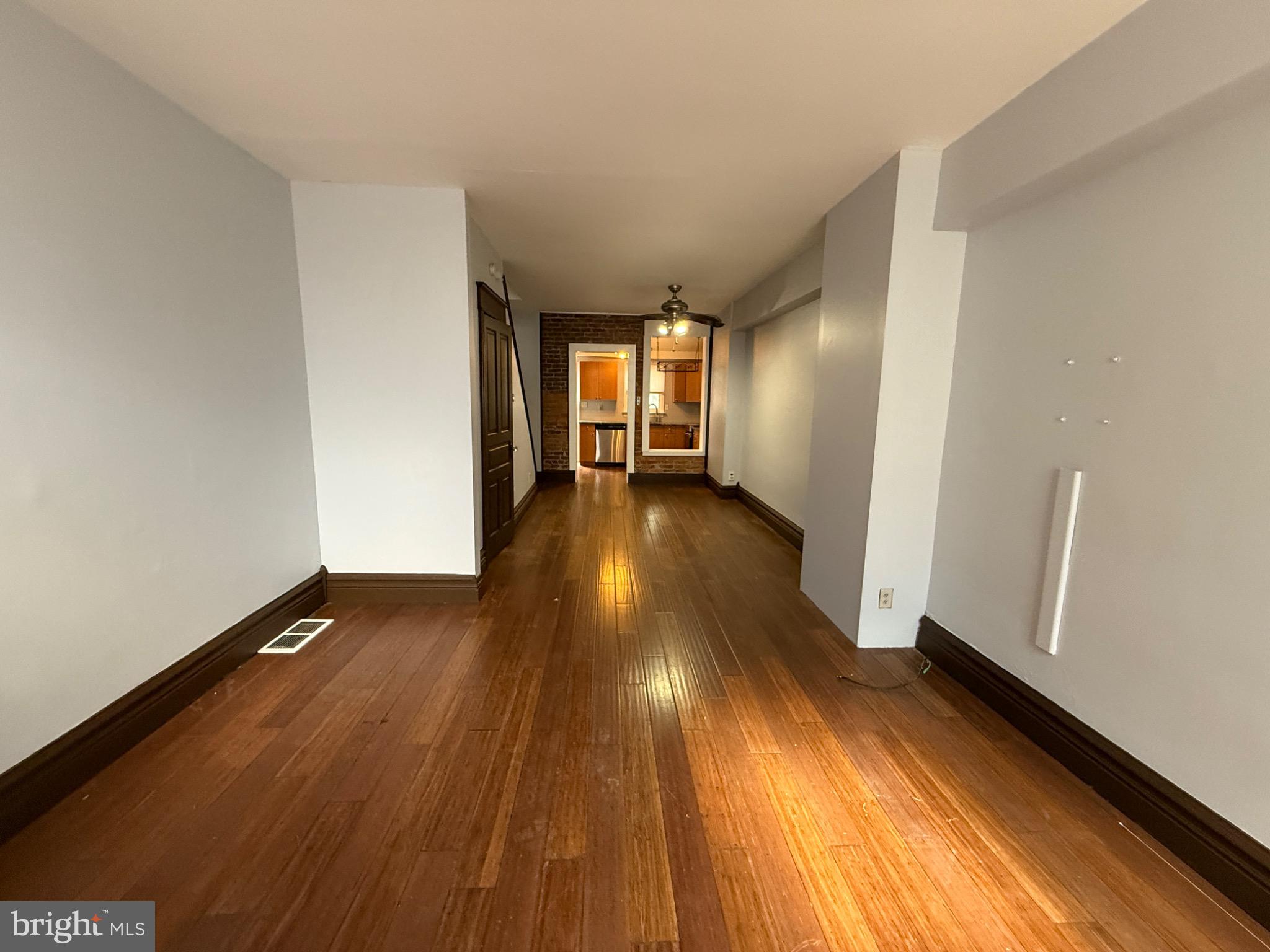 Nestled in the heart of Center City, this charming Colonial townhouse, built in 1800, seamlessly blends historic elegance with modern convenience. As you step inside, you are greeted by a warm and inviting atmosphere that exudes comfort and style. The partially finished basement offers additional space for creativity, whether you envision a cozy den, a home gym, or a personal retreat. The heart of this home is undoubtedly the kitchen, where high-end appliances elevate your culinary experience. The electric oven and range provide precision cooking, while the sleek microwave ensures quick meal prep. The dishwasher makes clean-up a breeze, allowing you to spend more time enjoying your meals and less time in the kitchen. With two well-appointed bedrooms, this residence provides a serene sanctuary for rest and relaxation. The full bathroom is thoughtfully designed, featuring modern fixtures that enhance your daily routine. The convenience of an in-home laundry area, located in the basement, adds to the ease of living, allowing you to manage chores without leaving the comfort of your home. Outside, the property offers off-street parking for two vehicles, a rare find in this vibrant neighborhood. While there is no pool, the surrounding area is rich with parks and recreational opportunities, inviting you to explore the outdoors and enjoy the community. This home is not just a place to live; it's a lifestyle. Experience the charm of historic architecture combined with the comforts of modern living. Whether you're hosting intimate gatherings or enjoying quiet evenings at home, this townhouse provides the perfect backdrop for creating lasting memories. Embrace the unique character of Center City and make this delightful residence your own.