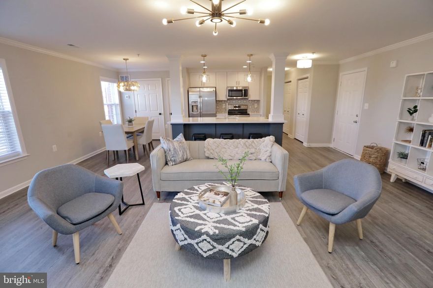 Completely remodeled!!!!  Beautiful top level condo overlooking the town of Laplata offering two large bedrooms with two full baths.  Gorgeous vinyl plank floors, all baths are featured with custom ceramic tile.  All new stainless Steel appliances, custom cabinets and stunning granite counter tops with subway tile back splash.    The halls and common areas have all been remodeled.  Two parking spaces included.