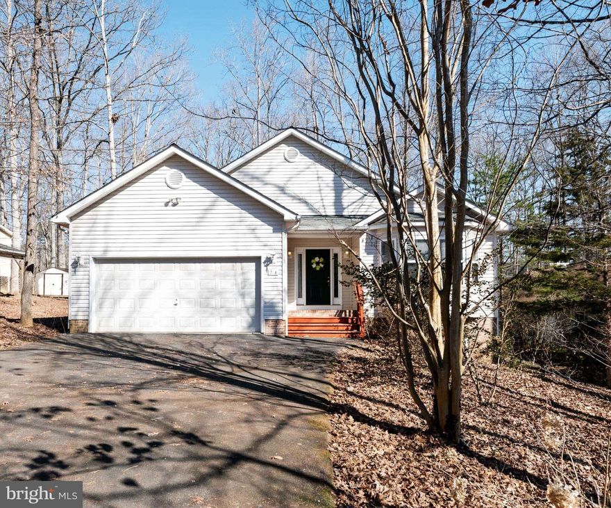 Quaint 3 bedroom/2 bath Rambler in amenity-rich Lake of the Woods!  Live here all year round or great get-away! Golfing, boating, fishing, equestrian center, biking/walking trails, tennis/pickle ball courts, community center, fitness center,  security gate, etc...    Large entry hall leading to Great Room with vaulted ceilings and fireplace.  Open to Dining Room, Kitchen and deck to more than 1/3 acre lot. Kitchen with ample island and plenty of storage space.  Generous bedroom sizes throughout with double closets.  Spacious Primary bedroom with 2 walk-in closets.  Double sinks, soaking tub, and separate shower in the primary bathroom.  Ample 2100+ square foot  home.  Laundry- Mud Room just off 2 car garage.  HSA Warranty included.  Offers to be reviewed Sunday afternoon.  Please submit any offers by 2pm on March 14th.