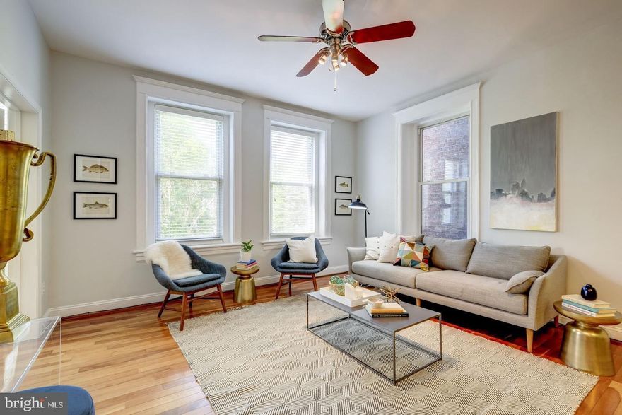 Pristine, light-filled 2 Bedroom/1.5 Bath condo in the historic Kalorama Triangle! This south-facing condominium is favorably located within the building and lives like a row house with the entrance right off the Lobby (no long hallways or waiting for the elevator necessary!)  and sits ELEVATED ABOVE THE STREET overlooking a verdant garden with blooming flowers and evergreens.  This 962 sq ft unit features 10 ft ceilings, oversized windows, Brazilian cherry floors, modern kitchen with granite island and counters and SS Appliances in  OPEN FLOOR PLAN.  Owner Bedroom in the rear of the unit includes newly updated en suite bath along with custom built-ins and custom closets. French doors lead to to the second bedroom with custom closets and 3 large bay windows.  Extra separate storage included. Steps to Walter Pierce Park, a few blocks to the National ZOO,  half a mile to Woodley Park Metro! A short stroll to Tryst, The Line Hotel and Lucky Buns.  PET FRIENDLY! Laundry Rooms on each floor of building and  one is conveniently located next door to #102.  Currently tenant-occupied.