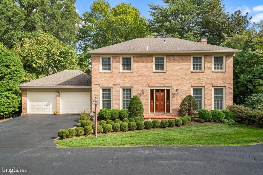 Stately and beautifully updated, this 5-bedroom, 3 full and 1 half bath colonial is tucked away on a private cul-de-sac and offers the perfect blend of elegance, comfort, and functionality. Freshly painted and filled with high-end finishes, this exceptional home showcases crown molding throughout, 4-inch wood baseboards, and gleaming hardwood floors across the main level and upper levels.

A welcoming foyer with limestone flooring sets the tone. The spacious, light-filled living room flows seamlessly into the cozy family room featuring a wood-burning fireplace.  Anderson sliding doors open to a stunning screened-in porch, the perfect spot to enjoy morning coffee or unwind with a good book.

The gourmet kitchen is a chef’s dream, featuring custom cabinetry, stainless steel appliances with a gas stove, Silestone countertops, and generous table space framed by a large bay window topped with a solid copper hip roof. A built-in desk area with drawers adds convenience. The convenient butler’s pantry boasts lighted glass-front cabinetry, under-cabinet lighting, and Siberian granite, and flows beautifully into the dining room.  Just off the garage, the mudroom offers built-in cabinetry, a ceramic tile sink, and is plumbed for a washer/dryer hook-up. 

Upstairs, retreat to the primary ensuite featuring heated bathroom floors, a separate vanity, soaking tub, standalone shower, and abundant closet space including a walk-in closet. An attached sitting room with floor-to-ceiling built-ins creates a true sanctuary. Three additional generously sized bedrooms and a full hall bath with tub/shower complete the upper level.

The finished walkout lower level expands the living space with a large recreation room featuring custom built-ins, flowing into an additional entertaining area with cabinetry, granite countertops, under-mount lighting, and a built-in mini refrigerator.   A beautiful patio and professionally landscaped yard is right outside this room. A fifth bedroom and full bath make this level ideal for an au pair or mother-in-law suite.

In addition, the lower level features a separate laundry room complete with washer and dryer, utility sink, and shelving for storage. This room flows into an additional storage/utility room, providing abundant space for organization and household needs.

This home is surrounded by mature trees, boxwoods, hydrangeas, azaleas, and seasonal blooms of roses, irises, peonies, and hostas.  A Pennsylvania bluestone walkway and outdoor landscape lighting accent the trees, stairs, and lower deck for stunning evening ambiance.

Major updates include:  Dual HVAC systems (Upper – 2020; Lower – 2012 with new motor in 2025)
Architectural shingle roof (2011)

Fantastic location just minutes from 495, 395, and Little River Turnpike, with convenient access to grocery stores and restaurants.

Extra bonus: This home is just minutes from the Wakefield Chapel Recreation Association, and the seller’s membership can transfer to the new owner! Enjoy a community pool with separate baby pool, three lighted tennis courts, snack bar, covered pavilion, and a full calendar of fun activities.

A rare opportunity to own a truly special home in an unbeatable location.
