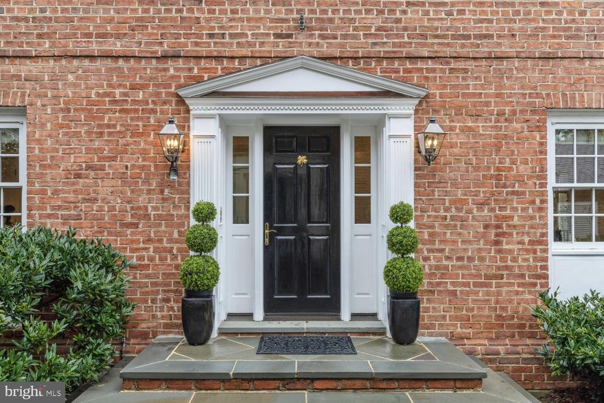 “It may come as a surprise particularly to Georgetown residents to learn there's enough land in their midst to construct [a] detached home and still have enough land left over for spacious gardens and play area for youngsters.” A bit of Old Williamsburg graces the East Village of Georgetown at the intersection of Avon Place and Avon Lane. One of only two homes built in the neighborhood by Lloyd Salyer of Williamsburg, VA. This traditional Colonial Williamsburg-style home marries the historic nature of the time with contemporary living.  Dedicated to its pristine construction, Salyer utilized the most authentic of materials including brick from a concern in Pennsylvania, copper downspouts, special millwork, window, door trim and cornices, to name a few.  Only 4 owners of record, each contributing thoughtful updates resulting in a 6-bedroom and 6-ensuite bathroom home with two half-baths on a compound comprising over a 1/3 of an acre. The home is masterfully positioned to maximize both privacy and natural light throughout the day. Just under 6,000 sqft of comfortable living spaces, high ceilings and boastful amounts of storage. Approximately 2,000 sqft of living space on each of the three levels.  Large 2-car attached garage parking with a third auxiliary garage on the grounds. An unheard-of amount of acreage for the neighborhood, primed and ready for a pool, pool house or additional dwelling unit. Just 5-blocks from restaurants shopping and amenities from Georgetown’s M St. and a 1.3 mile walk along the vibrant Georgetown Waterfront (Potomac River) to the Kennedy Center, Watergate and more.