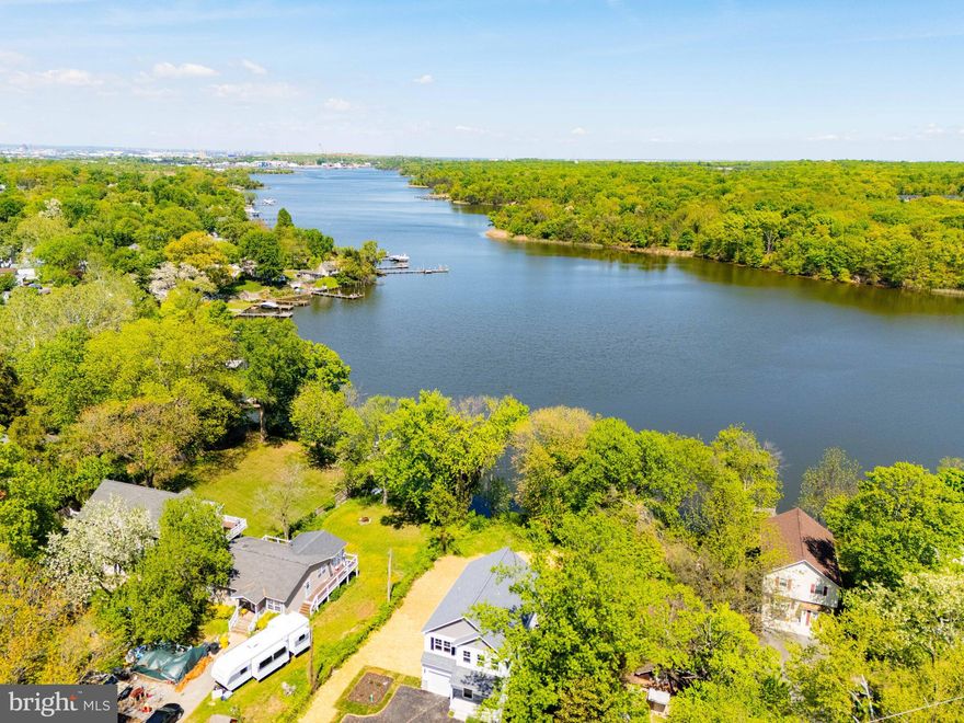 Rare opportunity to own a new construction waterfront home on Marley Creek, set on nearly half an acre with wide water views and a level, usable yard. It is hard to find this combination of new construction, land, and water access at this price point.

The main level is filled with natural light from the rear windows and keeps the focus on the water. The layout flows well from the living space into the kitchen and out to the backyard, making it easy for both everyday living and entertaining.

Upstairs offers four true bedrooms, including a spacious primary suite. The lower level is a full height walkout basement that is already roughed in for a future bathroom and ready to be finished, giving the next owner an easy path to add more living space and value.

The lot really stands out. There is room to expand outdoor living, add hardscaping, or create a full waterfront setup.

As an added benefit, the builder has secured a pier permit that will convey with the property, allowing the next owner to design and build to suit their needs. Deep water with an estimated depth of approximately 8 to 10 feet at the end of the future pier location, buyer to verify.

Tucked away in a quiet setting but still convenient to major routes, this is a rare chance to own a new construction waterfront home with flexibility to make it your own.