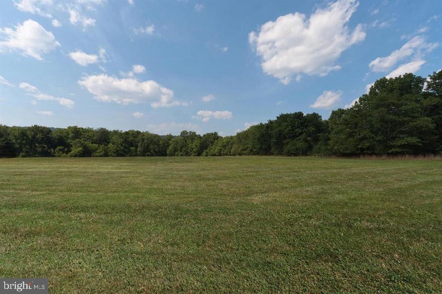 Please do not enter property without appointment being confirmed.  Do not Drive on any of the grass please.

This is your chance to build your dream property!

Discover your sanctuary in Solebury Township, a stone's throw from the vibrant culture and shopping of New Hope, PA. Nestled in a serene flag lot, this property offers an oasis of tranquility with its open, rolling landscapes edged by a forest of mature trees. Imagine the Pidcock Creek winding through these woods, adding a picturesque backdrop to your future home. Your everyday journey could include a drive through the quaint, historic Van Sant covered bridge, adding a touch of charm to your routine.

The area is a haven for outdoor enthusiasts and culture seekers alike. Cycle to Bowman's Hill Wildflower Preserve, jog along the canal towpath, or engage in fishing, kayaking, or boating on the Delaware River. The Historical Washington Crossing State Park is just minutes away, perfect for a day of exploration. When the mood strikes for dining and shopping, New Hope and Lambertville are a short drive away, offering an array of restaurants, boutiques, and the renowned Bucks County Playhouse.

This ready-to-build lot comes with a well already installed. Though the septic permit has expired, it is renewable, ensuring ease in starting your building project. Available to you are a plot plan and building designs. The lot is part of a shared driveway arrangement with a neighboring property, featuring a stunning custom tidewater cape style home by Lynn Taylor and built by Jarrett-Vaughn.  Property is presently under Act 319, and  the property cannot be further subdivided, preserving its exclusive appeal.  DRIVEWAY Entrance is shared, then splits at the top of the lot.  DO NOT DRIVE ON ANY OF THE GRASS PLEASE