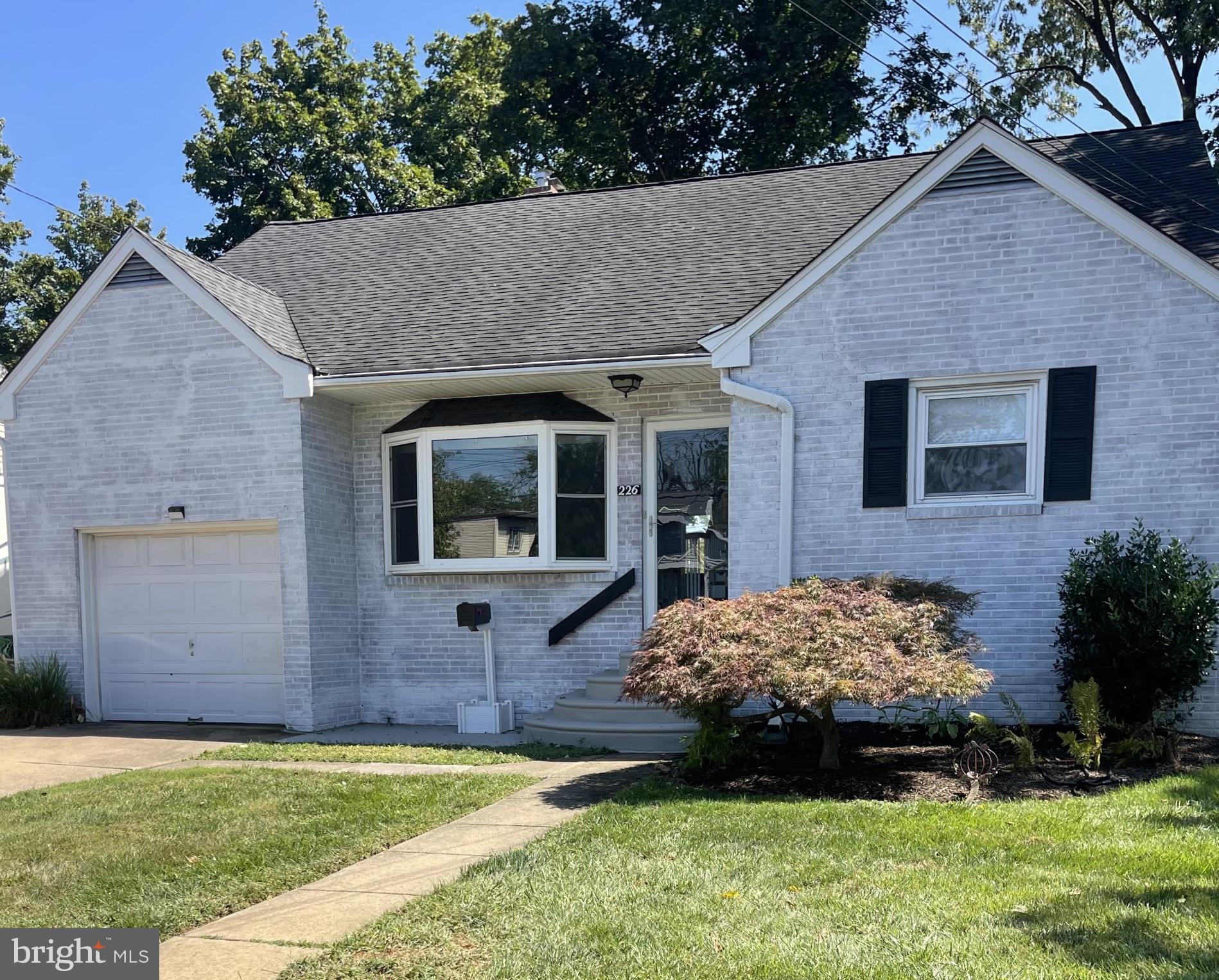 Welcome to Oreland - Springfield Township School District -
This beautiful all-brick, 4-bedroom, 2.5-bath Cape Cod sits in the heart of Oreland, within the highly rated Springfield Township School District.
Step inside to find the freshly painted interior and hardwood floors throughout. The sun-filled living room features a bay window and brick fireplace, the dining room with chair rail and casement windows leads right into the updated kitchen complete with stainless steel appliances, granite countertops, tumbled marble backsplash, and recessed lighting.
The first floor offers two large bedrooms and a spacious ceramic-tiled hall bath. Upstairs you’ll find two more generously sized bedrooms, another full hall bath, and a large storage closet.
The finished lower level is designed for entertaining with a built-in wet bar and half bath, plus plenty of functional space including a workshop/utility area, a separate laundry room, and direct access to the backyard.
Outdoor living is just as inviting, featuring a brand-new rear deck with new foundation, a covered patio with new posts, and a new fence surrounding the huge, level yard — perfect for gatherings, play, or simply relaxing. -
Additional highlights include:
* Highly efficient gas baseboard heating with new covers on the main level
* Two-zoned central A/C
* 200-amp electric service
* Newer windows throughout
* 1-car attached garage with storage above
* Electric charger in garage
*Home generator
* New lateral sewer line. -
All within walking distance to the Oreland Train Station (Lansdale/Doylestown Line) and just minutes to Route 309 and the PA Turnpike.
FYI — The basement will be completed prior to closing, new floors, all new bathroom