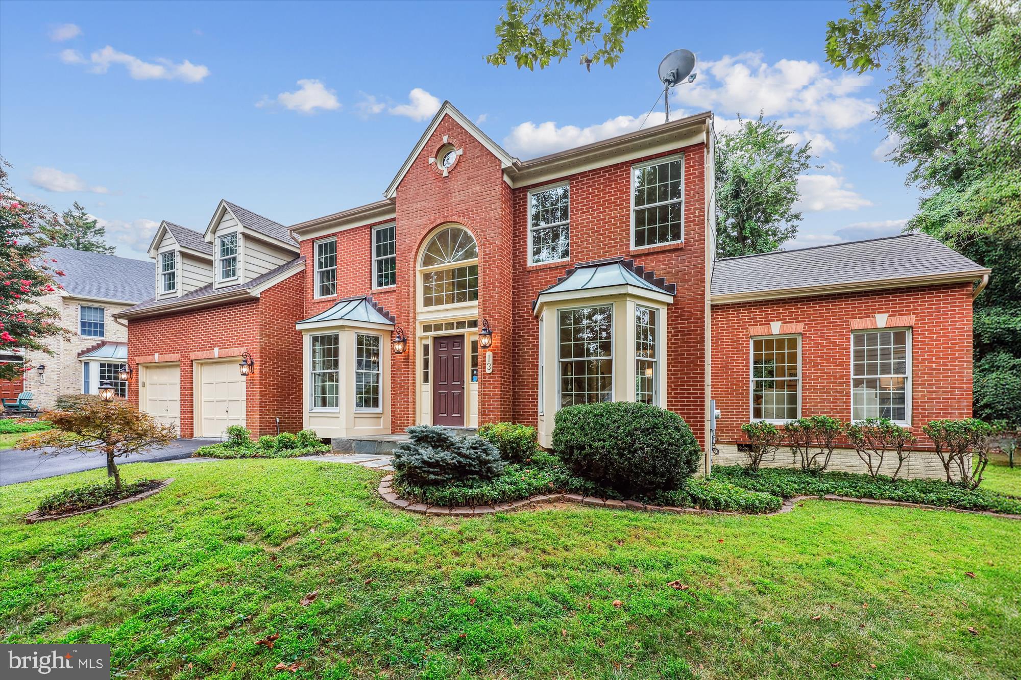 DEADLINE FOR OFFERS TENTATIVELY SET FOR WEDNESDAY, 8/27/25 @ 3PM. Unbelievable opportunity to own a detached home on a premium cul-de-sac lot in Rose Hill Falls. This stunning 4BR+den/3.5BA brick-front colonial with a two-car garage was built by the Magruder Companies and the quality of craftsmanship is everywhere. Designer-home appeal includes a great sense of light and spaciousness with 9-foot, 10-foot, and cathedral ceilings, skylights, new custom painting, hardwood flooring throughout the main and upper levels, ceramic tile flooring in kitchen and baths, and elaborate moldings throughout; remodeled kitchen with granite countertops, stainless appliances, and 10-ft. center island opening to a step-down family room with floor-to-ceiling stone fireplace; glorious sunroom with sliding glass door to rear composite deck and private yard; BONUS conservatory rare to the neighborhood. Flagstone front walkway and front stoop; grand two-story foyer entrance, curved staircase, coat closet and powder room; open formal living room with bay window and adjoining dining room with bay window; BONUS side conservatory off of living room with double glass door entry and ceiling fan; main level study with built-in bookshelf and bay window; gourmet kitchen with ceramic tile flooring, granite countertops, upgraded stainless appliances, 10-ft. granite center island/breakfast bar, recessed lighting, and pantry; sunroom/breakfast room off of kitchen with tile flooring, walls of windows, recessed lighting, two skylights, and sliding glass doors to composite deck; step-down family room with 10-foot ceiling, ceiling fan, and floor-to-ceiling stone wood-burring fireplace with raised slate hearth and wood mantel; mudroom off of kitchen with washer/dryer, utility sink, laundry chute, and access to two-car garage; curved solid oak staircase to upper level from foyer; enormous (26’ x 20’) primary bedroom suite with cathedral ceiling, private sitting room/office, and dormer storage closet; double glass doors to dressing room with walk-in closet, skylights, and vanity with makeup counter; primary bathroom with cathedral ceilings, double vanities, walk-in shower, jacuzzi whirlpool tub, and separate water closet; three additional bedrooms on the upper level and two additional full baths; unfinished lower level with walk-up stairs to Bilko door exit, painted concrete flooring, multiple areas for future expansion (recreation room, media room, exercise room, wine cellar, full bath rough-in); architectural shingle roof, dual-zone HVAC with new gas furnace and CAC on main level (2024), electric heat pump on upper level, and 75-gallon water heater (2021). Without leaving the neighborhood, there are over a mile of bucolic walking/bike paths, forested conservation areas, sidewalks, two tot lots, a private tennis court, and a basketball court. Adjacent to the development sits the City of Rockville's Bullard Park at one end of the neighborhood and Julius West Middle School's sports fields, track, and tennis courts on the other side. Be part of the vibrant Rockville Town Center featuring shopping, fine restaurants, sidewalk cafes, the Rockville Regional Library, Regal Cinemas, and other entertainment/cultural facilities. Less than a mile from the Rockville Metro for easy commute via mass transit.