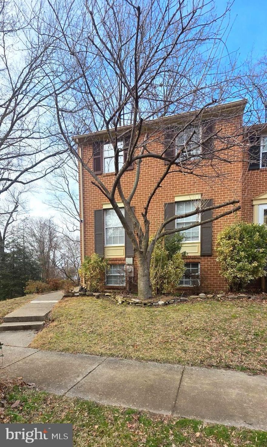 Rare end-unit in the water-oriented Elizabeth’s Landing!
This 3BR/2BA brick townhome sits on a unique double lot with partial water views and exceptional privacy. The main level offers a comfortable living area and an updated kitchen with granite countertops and stainless steel appliances. Outside, a spacious rear deck overlooks a peaceful, wooded backdrop, perfect for relaxing or entertaining. The walk-out basement adds flexibility and direct access to the massive backyard, which features mature trees and plenty of room for gardening or play. A rare opportunity to own one of the largest lots in the community with incredible potential to customize. 
Don't miss this private retreat!