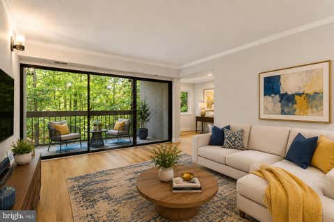 Photo of 11723 Karbon Hill Court #104, RESTON, VA 20191 (MLS # VAFX2332562)