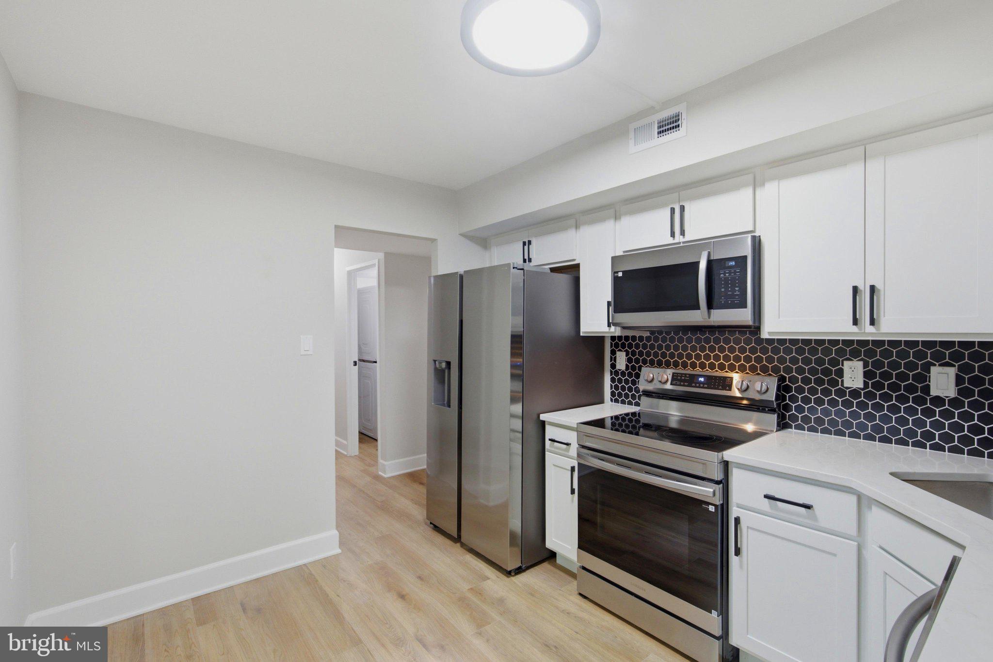 11723 KARBON HILL COURT 104