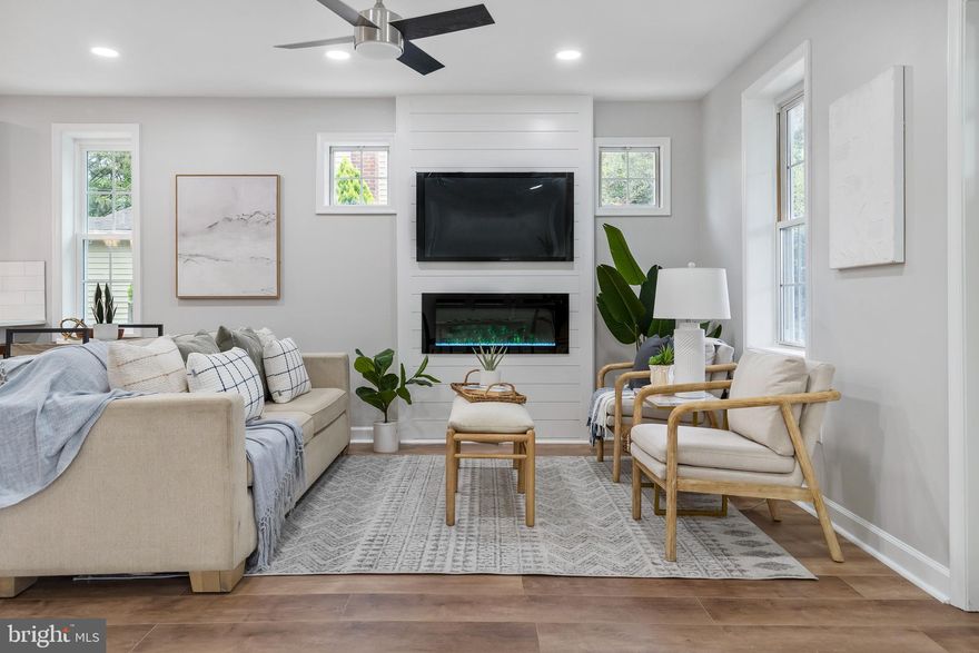 This Beautiful Home boasts 5 Bedrooms, 3.5 Bathrooms, Recess Lights, High-end fixtures, a 4-Car Parking Pad, and an Open Floor plan with over 2,000 square feet of finished living space. The first floor features a Primary Bedroom with a Full bathroom, 1 Half Bathroom, a large Living Room,Dining Room and an Electric  Fireplace. A Gourmet Kitchen that Features Stainless Steel appliances, Quartz Countertops, a 5 Burner Stove with Hood, Pot Filler & Custom Backsplash. The second floor offers a Full Bath and 2 bedrooms.  The Finished basement includes 2 Bedrooms and a Full Bathroom.