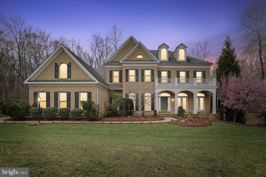 Back on the Market !!! Introducing 4350 Windermere View Place - the ONE You have Waited to Find in the Private Gated Enclave of Custom 'Basheer & Edgemoore' Estate Homes in the Reserve of River Falls on the Occoquan River*This Exceptional Brick-Front 6 Bedroom Home, each with a Private Full Bath, is sited on a Breathtaking 7-Acre Treed Lot. Beautifully Maintained & Updated in 2021 by the Original Owners, this Outstanding Extended 'Beaumont' Model features a Rare Main Level Guest Suite, a Gracious English Front Porch, 3 Impressive Two-Sided Fireplaces, a Fabulous Screened-In Back Porch for Outdoor Entertaining overlooking the Mature Park-Like Acreage, Gleaming Maple Wide-Plank Hardwoods throughout the Main Level & Exquisite Imported Finishes in the Gourmet Chef's Kitchen & Designer Tile in the 7.5 Baths*Welcome Family & Friends at the Stunning Front Foyer opening to the Impressive Living Room & Elegant Formal Dining Room with Chair & Triple Crown Molding highlighting the 10ft Ceilings* The Main Floor Library Overlooking the  Creek Offers the Ultimate Private Office with an 18ft Wall of Gorgeous Cherry BookShelves*The Main Level Guest Suite offers a Light-Filled Bedroom, Private Bath with Shower & Walk-In Closet*Designed for Elegant Entertaining, with Gorgeous Wood Floors extending Across the Entire Level! Past the Turned Oak Front Staircase is the 24x17 ft Family Room with a Double Sided Fireplace shared with the Great Room adjoining the Kitchen & Breakfast Room*The Morning Room would be Ideal for a Fabulous Summer Brunch or a Winter Afternoon enjoying the Snow Fall from the Wall of Windows*The Breakfast Room opens to the Screened Porch with Stairs Down to the Backyard* The Outstanding Chef's Ultimate Kitchen boasts 42" Designer Natural Cherry Level-5 Cabinetry with a French Door Refrigerator, Stainless Steel Wall Ovens, 5 Burner Gas Cooktop ready to Host a Huge Party or Most Intimate Celebrations! The Island has Ample Bar Seating, a Butler's Pantry at the Dining Entrance with a Wine Fridge & a Kitchen Desk - all with Imported Italian Granite Countertops with a Ceramic Backsplash. The Kitchen Hall opens to the Spacious Walk-In Pantry & Mudroom Closet off the Extra-Tall 3 Car Side-Load Garage. Take the Front or Back Oak Staircase to the Beautifully Appointed Upper Bedroom Level*The Stunning Owner's Upper Wing Offers the Ultimate Space to Relax with Outstanding Tree-Top Views*Expansive Owner's Bedroom features a Tray Ceiling & Stunning Private Sitting Room with a Gas Fireplace, Gorgeous Built-In Cocktail/Coffee Wall with a Wetbar & Enormous Double Walk-In Closets with Custom Cabinetry*The Owner's Private En Suite is the Luxurious SPA Escape from the Jetted Soaking Tub to the Double Shower with Multiple Tower Showerheads, Gorgeous Granite & Cherry Double Vanities, with Twin Water Closets*The Upper Floor boasts 3 Additional Bedroom Suites with Large Closets & Private Bathrooms plus a Convenient Laundry Room with Front Loading Washer & Dryer off the 2nd Staircase*The Lowest WALKOUT Level Offers a 6th Bedroom with a Walk-In Closet & Full Bath*The Lowest Level offers Multiple Game Rooms & a 3rd Double Fireplace welcoming everyone to the Granite Wetbar off the Theater Room*The Rec Room opens to the  Backyard Patio complete with a Relaxing Hot-Tub & Space to Barbeque! The Lowest Level offers a Huge Storage Room plus an Unfinished Space that could be a 7th Bedroom/Home Gym/Studio *This Magnificent Home offers an Unparalleled Lifestyle with Thoughtfully Designed Fine Home Construction in the Premier Golf Community in Eastern PW County*This Estate Home in the Sought-After Gated Reserve of River Falls offers Fabulous Amenities, from the Resort Pool to the Tennis Courts, Running Trails, Basketball Courts & Multiple Playgrounds*Award-Winning Schools! The Outstanding Location offers a Quick 35 Minute Commute to Ft. Belvoir, 40 Minutes to Quantico or Take the DC/Pentagon Express Bus or VRE Train into the City*Welcome Home!