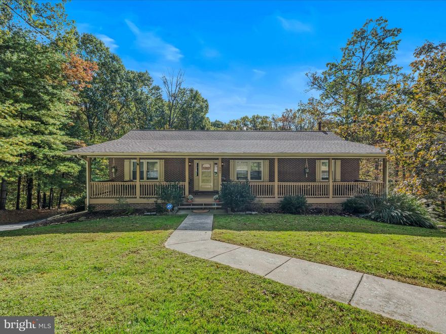 All-Brick Rancher on 2+ Acres — Where Comfort Meets Country Charm!

Escape to peace and privacy in this stunning all-brick rancher set on over 2 acres of beautiful land. With 4 bedrooms, 3 full baths, and both attached and detached garages, this home perfectly blends modern comfort with timeless craftsmanship.

Step inside to discover gleaming hardwood floors throughout the main level, a chef-inspired kitchen featuring granite countertops, a center island, and upgraded stainless appliances. The spacious primary suite is your private retreat, complete with a walk-in closet, ceiling fan, and a luxurious bath boasting a soaking tub, separate shower, and dual vanities. Two additional bedrooms and a beautifully tiled guest bath complete the main level.

Downstairs, the fully finished lower level offers endless possibilities — a large rec room with a wood-burning fireplace, a 4th bedroom with walk-in closet, a full bath, and a laundry area. Perfect for guests, hobbies, or movie nights!

Outside, enjoy every season from your full-length front porch or entertain on the rear deck overlooking your private yard. Roast marshmallows by the fire pit, or take advantage of your 24x31 detached garage — ideal for extra cars, storage, or a workshop.

Recent upgrades to the property are, the Roof in 2022,  a Radon system was added in 2024,  new Water heater installed in 2025, and new Sump Pump in 2025.

This home truly has it all — space, style, and updates — all nestled in a peaceful setting just minutes from town.

Move-in ready and waiting for you to call it home!