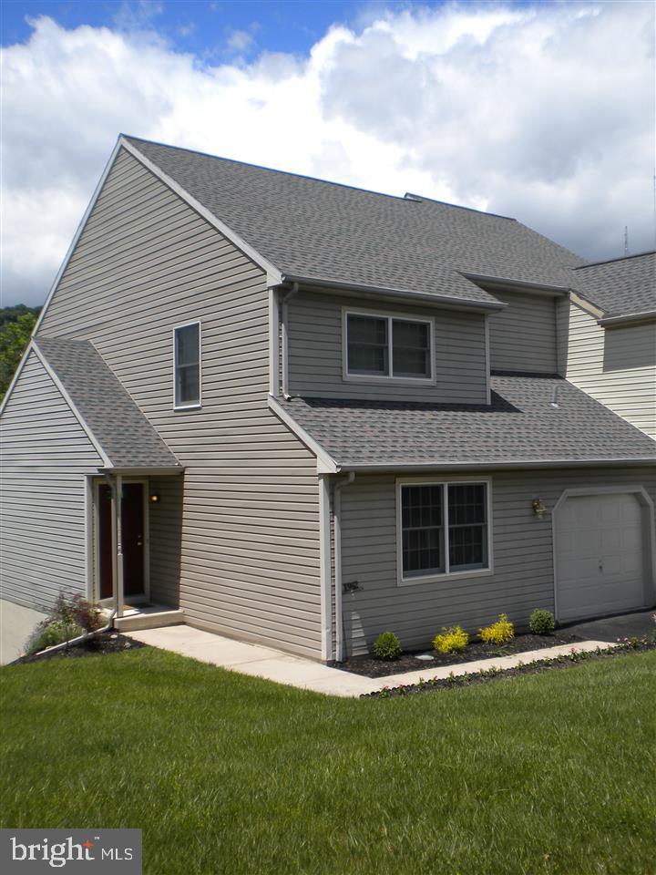Lovely, spacious end-unit townhome with newer stainless steel appliances, heat pump and carpet. Neutral colors & fresh paint. 1st floor room w/full bath could be bedroom or office. Washer & dryer in closet of 2nd floor bath. Huge master bedroom on 2nd floor with full bath & walk in closet. 2nd floor loft, too! Finished lower level has wet bar& half bath. Great for entertaining or use it for another bedroom. Easy access to Harrisburg, HACC, shopping, entertainment. 1 year home warranty included. Come see!
