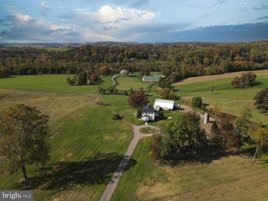 Country Estate for Lease! A fresh new start for this lovely home which sits down a long lane. Top to bottom all the basics have been tended to, sealed, insulated, renovated, and secured! NEW: Fresh Paint, Flooring, Appliances, HVAC System, Roof, Plumbing & More! Center Hall  Entry with Huge Formal Dining & Living Rooms, Island Kitchen with Breakfast Room, Exit to Side Trex Deck & Laundry Closet. Powder Room off Hallway. Main Level Primary Bedroom with attached Full Bath, Walk-in Closet and Side Exit to Side Porch. Upper Level features 3 Additional, Spacious Bedrooms with Ample Closet Space and 2 Full Baths. Tenant will have about 2 acres around the house to enjoy (the owner/landlord Farms the remainder.) Pets Ok Case By Case (Dogs Only) and must be approved before applying. Application Link in listing - each adult applicant must complete an application. Available Nov. 1, 2023.
