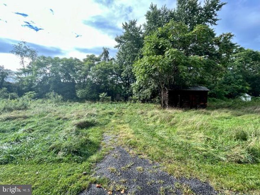 Gore VA, Level lot approximately .91 acre on Lot 74-220 Middle Lane.  Old trailer on rear of lot conveys along with the storage building seen from the road.  No country records of any well or septic on site.  Sold Strictly "AS IS".  Old well located near the trailer.