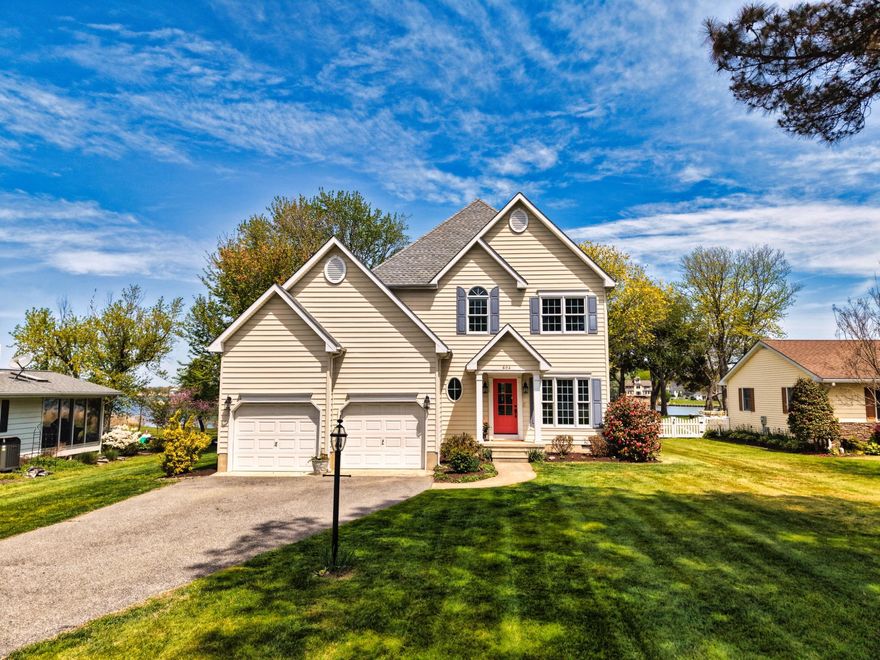 This charming Colonial home in the desirable Bay City community offers a perfect blend of comfort and convenience. With 1,716 sq. ft. of well-designed space, the open floor plan features a cozy living area with a propane fireplace, a bright breakfast area, and a kitchen island ideal for gatherings. Enjoy the luxury of a primary bath with a jetted tub and stand alone shower. Step outside to a beautifully landscaped 0.44-acre lot, complete with a hardscaped patio for outdoor relaxation. The property boasts 80 feet of waterfront along Broad Creek, perfect for kayaking or enjoying serene water views. Pier permit in process. Bay City offers fantastic amenities, including a beach, playgrounds, and common grounds, fostering a vibrant community spirit. Nearby parks and excellent schools enhance the neighborhood's appeal, while convenient access to commuter lots and the airport ensures easy travel. Experience the warmth of home in this inviting setting! Whether you are looking for a weekend home or looking for the island life 365 days a year, 604 Broadcreek is exactly what you have been waiting for!