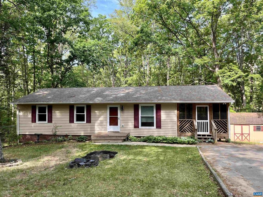 Conveniently Located with Tranquil Privacy! Nestled just off the road for ultimate peace and serenity, this charming ranch home offers easy access to both Interstate 64 and Route 250, making commuting to Charlottesville and Zion Crossroads a breeze. Inside, you?ll appreciate the warmth of hardwood floors throughout the living room, kitchen, hallway, and primary bedroom, while both bathrooms feature stylish tile. The spacious basement is perfect for entertaining, with a portion left unfinished to provide ample storage space. Enjoy the serene surroundings from the screened-in porch?ideal for sipping your morning coffee or dining outdoors in the evening. The property also boasts a partially paved driveway and a fenced backyard. Experience the best of both convenience and tranquility in this delightful home! Roof and Screened-In Porch were done in 2016. New windows in 2022. The driveway was paved in 2018.