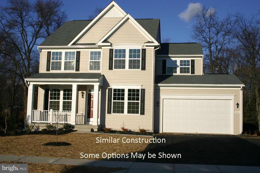 Dan Ryan Builders at McCauley Crossing offers this beautiful Newbury II being built with tons of gorgeous features like expanded plan for big open spaces, big family room with gas fireplace, classy island kitchen with granite tops & hardwood flooring, master suite with tray ceiling & double vanity bath, gas heat, 2x6 construction for extra insulation, full basement with areaway walkout!