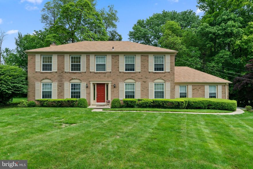 Situated in the highly sought-after neighborhood of Villanova, this stunning Center Hall brick colonial at 1326 Prospect Hill Road boasts exceptional curb appeal and a prime location. The property's attractiveness is especially striking in the fall, when one of the trees transforms its leaves into glorious shades of yellow, orange, and red.

As you enter, you are greeted by a classic floor plan, with the living room to the left and a dining room to the right. The dining room flows seamlessly into the kitchen, which features granite countertops, a tile floor, an electric cooktop, and a wall oven. The spacious breakfast area in the kitchen includes a sliding glass door that opens to a deck and beautiful grounds. The kitchen also provides convenient access to a laundry room and an attached two-car garage.

The kitchen leads to a family room with a fireplace and a floor-to-ceiling brick accent wall, perfect for relaxing evenings. A powder room is nearby on the first floor.

The second floor features four bedrooms, including a primary bedroom with an en-suite bathroom that boasts a shower, double vanity, and makeup vanity area. Three additional generously sized bedrooms share a tiled hall bath with a double vanity.

The finished lower level offers a large recreation area with built-in shelving, ample storage space, and a workbench area, ideal for hobbies and projects. The outdoor space includes a deck that extends to a level, well-maintained rear yard, perfect for entertaining or enjoying the outdoors.

The location is particularly desirable for its proximity to the intersection of Routes 76 and 476, providing easy access to all major transportation routes. It is served by award-winning schools and is near dining, recreation, and shopping, including the King of Prussia Mall.