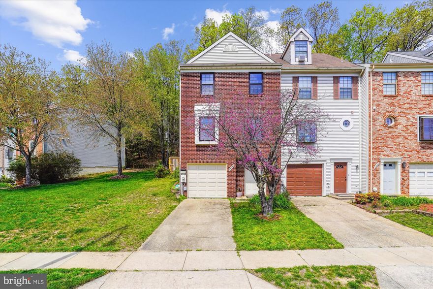 Welcome Home to 7926 Ashford Blvd!  Well maintained and Move-In Ready!!   End-Unit w/Garage townhome featuring 3 bedrooms, 2 full and 1 half baths on 3-fully finished levels!  This home offers a welcoming ceramic tile  foyer, a fully finished rec room, and garage access on the entry level.  The upper level open concept living space offers a sunken living room with fireplace and SGD access to outside,  a  separate dining area with hardwood flooring, a spacious open table-spaced kitchen and half bath!  The upstairs level includes a primary bedroom and  private bath with jetted spa tub, two additional good-sized bedrooms, a full bath and linen closet round out this level.  This property has been  freshly painted with new carpet and is waiting for you to call home.  Located in highly desirable Laurel Lakes community, you are convenient to all that Laurel has to offer including abundant dining, entertainment, shopping options and local activities, not to mention nearby access to Route 1, the I95 and Route 200 access points.  Better hurry to see as this one won't last!!