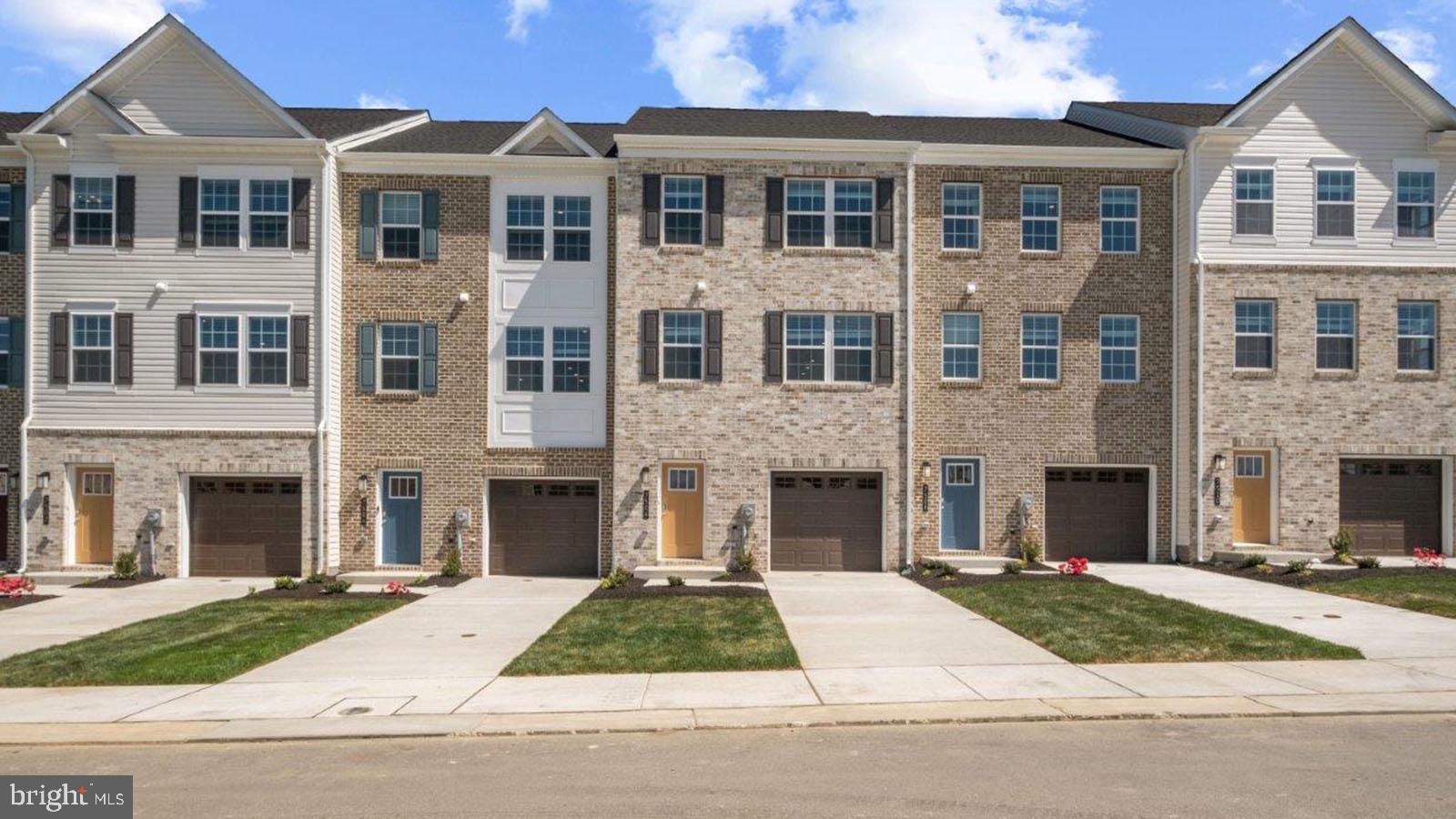 GREAT VALUE. QUICK MOVE!! NEAR AMENITIES. This townhome is located near community amenities! This Lafayette townhome offers1,969 square-foot, with 3 bedrooms, 3.5 bathroom, an 12X10 DECK INCLUDED and 1 car front load garage. There is plenty of space for entertaining family and friends in your finished lower level den w/ full bath on the lower level and den leading you to backyard green space.
The mail level offers an open concept living area, features a rear island kitchen with Stainless Steel Whirlpool kitchen appliances with 5-burner gas range, upgraded PANEL Espresso Cabinets and Quartz Counter tops. Hard surface flooring in the lower level den and main level. The third level has a gorgeous owners suite with a large walk-in closet and features a luxury owners shower with Quartz counter tops. Two secondary bedrooms, upper level laundry, and hall bathroom with White Quartz counter tops. This home is also equipped with smart home technology. The package includes a keyless entry, Skybell (video doorbell), programmable thermostat to adjust your temperature from your smartphone and much more. Commuting and shopping is made easy with quick access to 1-495, Route 5 and to the Washington DC area.