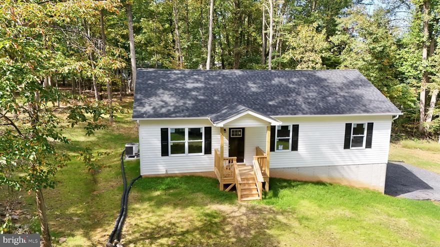 Brand New Rancher home Just completed on partially finished basement about a mile from the lake and club!  Open floor plan with lvp flooring in the family rm, kitchen, dining and hallway area. The kitchen offers granite countertops, stainless steel appliances, and beautiful white cabinets. The primary bedroom offers on suite with walk-in shower and double vanity sink. Partial finished walk-out basement rough plumbed for full bath and one car garage.  No HOA and large lot 0.73 Acres. This home has it all and won't last!