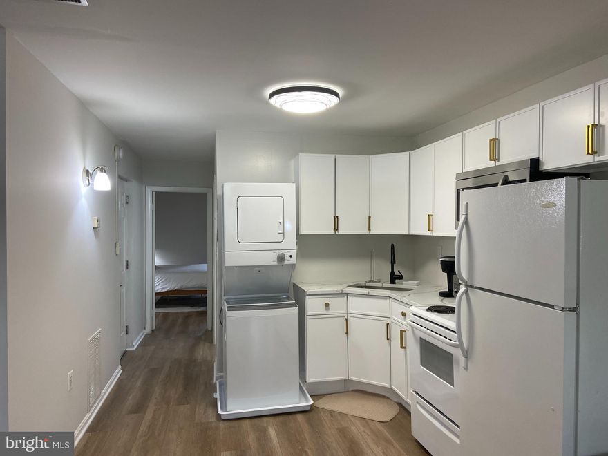 ** Live the Good Life in Historic Bolton Hill! ** This bright, beautifully renovated Baltimore City 1-bedroom, 1-bath apartment offers charm, sunlight, and a connection to nature right in the heart of one of Baltimore’s most treasured neighborhoods. Perched between two lush parks — including Bolton Hill’s largest, Sumpter Park — this spacious, apartment is ideal for morning dog walks, afternoon reading sessions under a tree, or simply enjoying the view from the comfort of your oversized windows. Inside, large beautiful windows and light-colored laminate floors set the stage for an airy, light-filled living space. A decorative living room fireplace adds timeless character, while huge windows frame postcard-worthy park views that make every day feel special. The newly updated kitchen is as stylish as it is functional, featuring sleek quartz countertops, a full-size stove, built-in microwave, dishwasher, and your own in-unit washer-dryer. The spacious bedroom offers room for a queen-sized bed plus a sitting area, and includes generous closet and storage options. A fully renovated bathroom with custom tilework completes the space. Convenient to the best of downtown, this gem is where classic charm meets everyday convenience. Available July 17th | $40 Application Fee | 700+ Credit Score Required | No smoking | Pets considered on a case-by-case basis