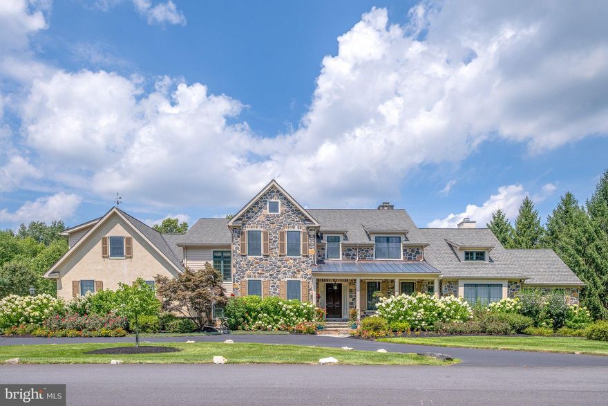 This stunning Applecross home nestled on a lush, landscaped 1 acre
private lot backing to mature growth open space, perfectly blends natural
beauty with modern living. It features an architecturally designed interior
with decorative mill work, 10’+ ceilings, elegant proportions, and abundant
amenities.
A gracious entry foyer in this mostly stone home, leads to an
elegant dining room and is steps to the 2 story family room showcasing
expansive views of the property. With vaulted ceilings & exceptional trim, as
well as a fireplace flanked by built-ins, it serves as the "comfort central" area
of the home.
The spacious gourmet kitchen has a large center island with Wolf & Sub
Zero appliances, as well as an adjacent light filled breakfast room. The first
floor is also host to a home office, and luxurious primary suite. This suite
features a sitting area with private access to a screened porch, an
expansive bedroom with tray ceiling, walk-in closet, & the most sumptuous 4
pc. Bath. The sitting area with fireplace doubles as a sanctuary with
convenient breakfast bar with sink, fridge, and custom cabinetry. 
There are 3 good size bedrooms and 2 full baths on the second floor as
well as two additional and substantial unfinished spaces. One is a light filled
room over top of the 3-car garage, very easily finished for an additional room. The other light filled space is off the 2nd floor Study.
The finished lower level has abundant daylight windows flanking two large
sitting/entertaining spaces, one serving as a comfortable theater. A
spacious private 5th Bedroom with its own windows and full bath with steam
shower, easily answers needs for in-law, au pair or 2nd primary bedroom.
The basement features a wet bar and wine cellar as well as 2
separate exercise rooms.
The exterior of this home and its position on the private home site is
spectacular, and exhibits the owner’s attention to detail in both the selection
and execution of the flowering plants that are timed for all seasons. The tree
and shrub diversity including apple, peach & plum trees, pay testament to
the horticultural history of the property, and benefit from the yard being
surrounded by dedicated conservancy space. Applecross is an intimate
community with du Pont estate roots in a premier Greenville location.
Schedule your tour today!