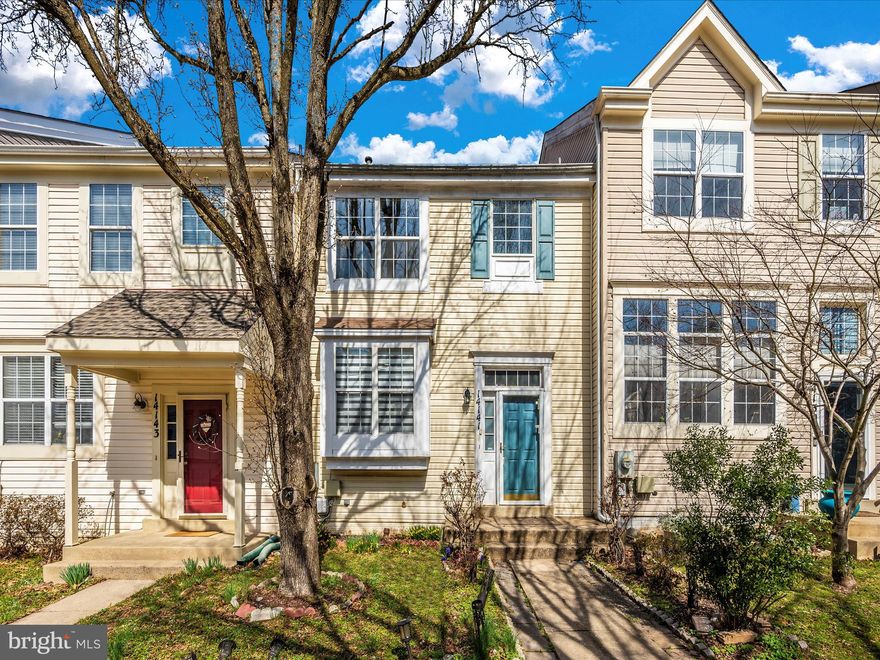 BACK ON THE MARKET! Buyer financing fell through, their loss is your gain! Serene townhome backing to trees and nature is ready for a new owner to take this home from better to best! As you enter the spacious foyer, you'll immediately notice the soaring ceilings and open and airy layout. The main level offers a large dining room and light filled living room with slider doors opening up to the deck surrounded by nature. On the other end of the main level is an ultra modern kitchen with wall ovens, gas cooktop with a hood overhead for the culinary enthusiast, modern espresso cabinetry with glass panels, stone countertops, and a glass tile backsplash to finish off the space. The kitchen is open to the dining room and living room for optimal enjoyment between guests and chefs. Upstairs to the bedroom level, you'll find the primary suite tucked away from the other bedrooms. The primary suite features vaulted ceilings, double closets and a large primary bath outfitted with dual sinks, a shower and separate soaking tub. Rounding off the bedroom level are two secondary bedrooms and another full bathroom. The large lower level features the laundry area, a hobby room or gym, a full bathroom and a large rec space with fireplace perfect for a "cave", family room, or movie room. This home is conveniently located near countless shopping, dining and entertainment options such as Safeway, Giant, Regal Germantown, Top Golf, Chick Fil A, Panera & Starbucks, just to name a few, with Robert A. McNair Elementary School, Kingsview Middle School and Northwest High School around the corner.