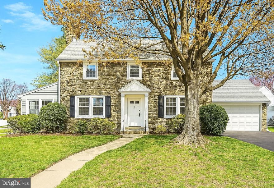 Welcome to 1001 Ormond Avenue, offering a wonderful combination of timeless design, with a rare opportunity for expansion, in the heart of Delaware County’s beloved Drexel Hill.

This stately stone Colonial stands as a proud testament to classic architecture and thoughtful stewardship. The current owners have lovingly preserved and enhanced this spacious home, investing in major updates with care and quality top of mind. A newer roof, energy-efficient windows, basement waterproofing, and central air conditioning bring modern comfort and peace of mind, while honoring the home’s original craftsmanship and character.

A warm and welcoming interior greets you with gleaming hardwood floors, custom millwork, and a well-designed layout that perfectly balances function and charm.  Whether you curl up by the fireplace in the spacious living room, enjoy a good book in the sunroom, entertain in the elegant dining room,  prep meals in the cheerful kitchen, or relax on the flagstone patio with views of your lush yard—every space feels homey.

What truly sets this property apart? The rare and spacious extra lot.
This coveted feature offers a unique opportunity to expand your living space in a way that few homes can. Imagine extending the kitchen into a large, light-filled family room addition—perfect for modern living and entertaining. Beyond that, the lot easily accommodates plans for a pool and cabana, a dedicated play area, or a lush garden retreat with a greenhouse. The possibilities are endless and exciting.

Upstairs, the generous primary suite features a walk-in closet and a nicely updated ensuite bath with a walk-in shower. Two additional bedrooms share an updated hall bath, and the fourth bedroom is a finished attic retreat,  a sunlit escape with a wall of windows, and charming bench seating overlooking the backyard.  Square footage is far more than noted on public records, please see floor plans with details. 

The basement is partially finished and waterproofed, offering even more flexibility with a laundry area, workshop, and room for a home gym, hobby room, or entertainment area.

This isn’t just a house—it’s a legacy in the making, ready for its next chapter.