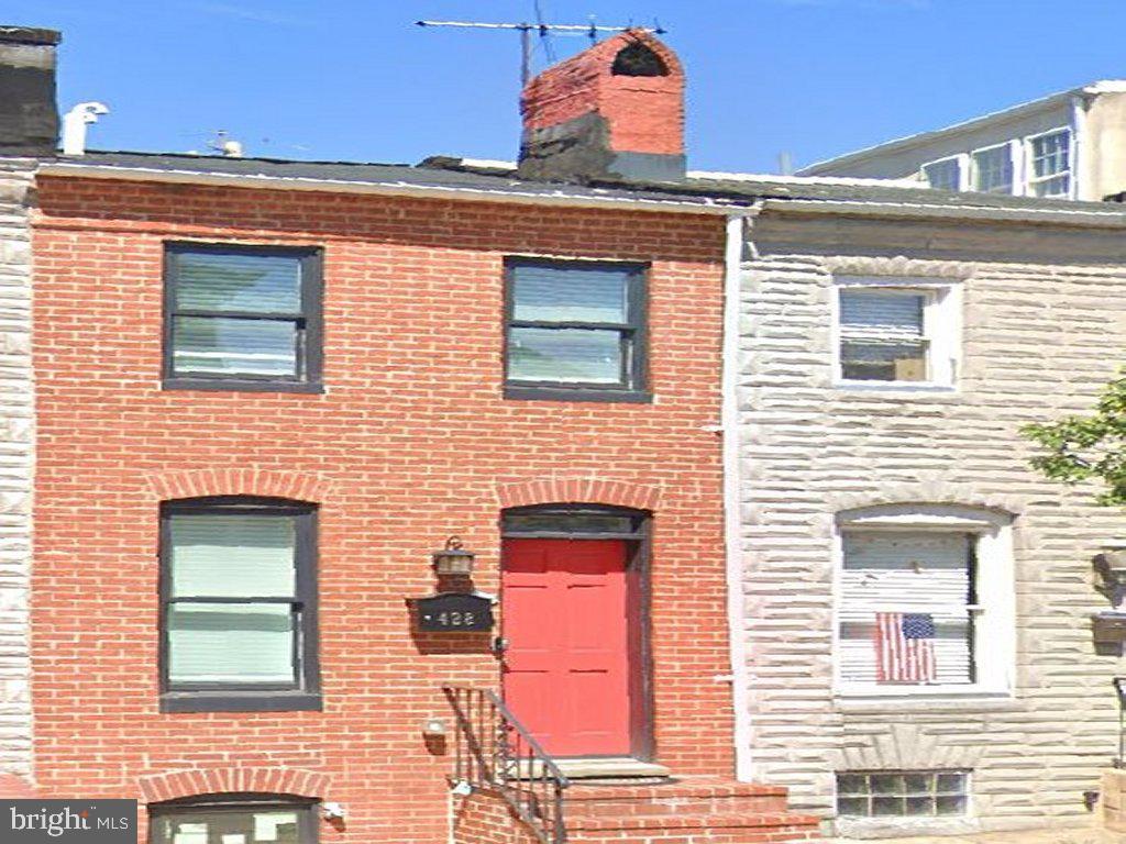 Welcome to a beautifully updated residence in the heart of Fells Point. Eight and a half years remaining CHAP tax credit. Enter inside to an open-concept layout featuring a warm and inviting living space with whitewashed exposed brick, a designated dining area and a thoughtfully designed kitchen complete with shaker-style cabinetry, a breakfast bar, waterfall-edge countertops, and sleek tile finishes. Upstairs, you'll find two comfortable bedrooms and a stylishly remodeled bathroom showcasing a walk-in shower and elegant marble surfaces. Located just a short distance to the Fells Point waterfront, Patterson Park and Johns Hopkins, this home also offers easy access to Harbor East, Canton, and major commuting routes.