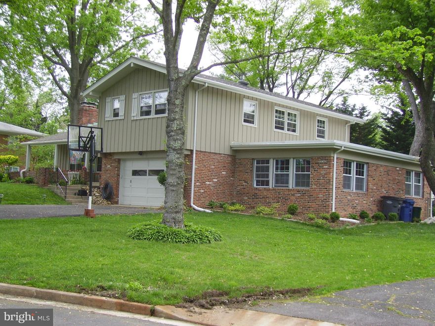 The property is now available for showings.  There may be a couple of painters in the house.  A handyman is doing a few things.  When they are finished the unit will be available to show and vacant.  The photos are from the past when it was occupied.  Unusually large split level on quiet road and a few steps to the Glen Forest Park and Pool.  Many renovations through the years--too many to list.  The rooms are spacious and light.  The first lower level is the ground level.  Walk to the elementary school and shopping.  Oversized one car garage with much storage space.  15 minutes to DC.  Pets OK on a case-by-case basis.